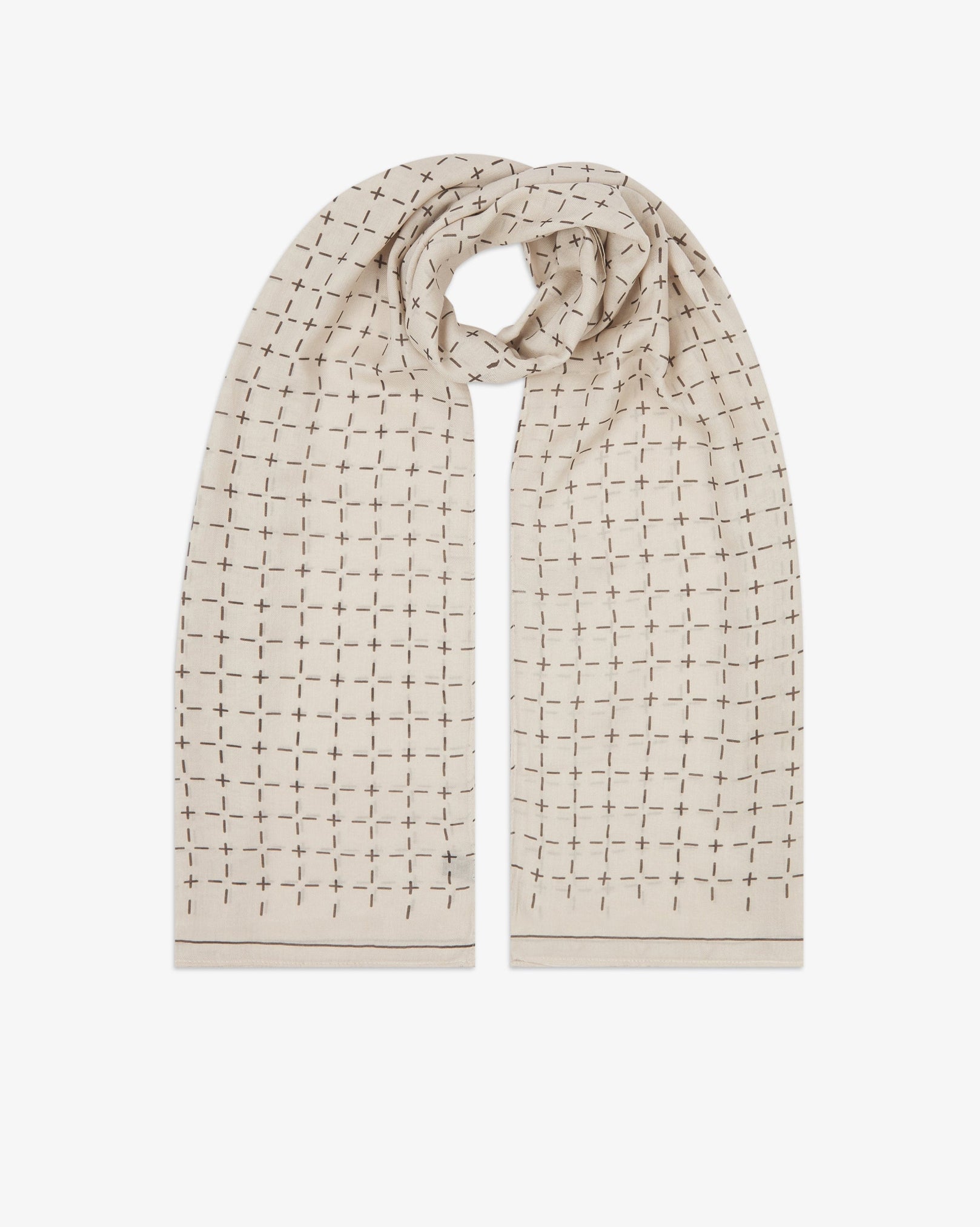 The 'Crosses' cream bohemian wide scarf looped with both ends parallel, showcasing a neat geometric grid of dark grey dashes and crosses on a pale cream background across the soft modal and wool blend fabric.