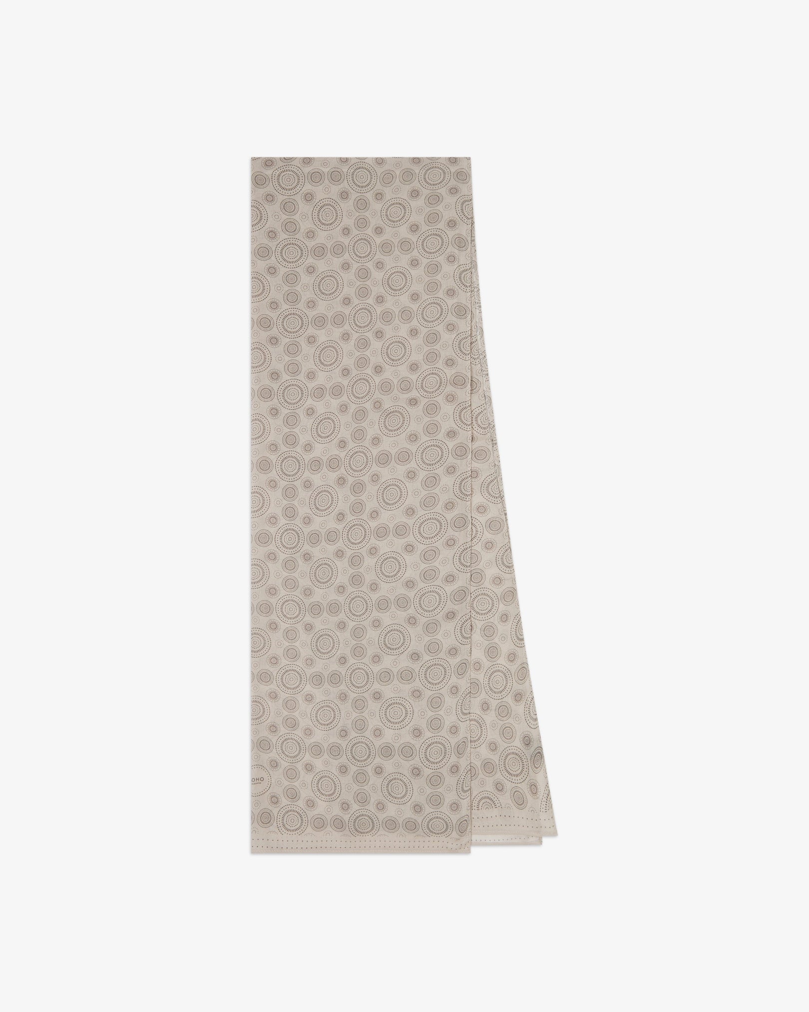 The 'Circles' cream bohemian wide scarf folded and presented vertically to show the full dimensions and repeating concentric Op art-inspired disc pattern in dark grey on a pale cream background.