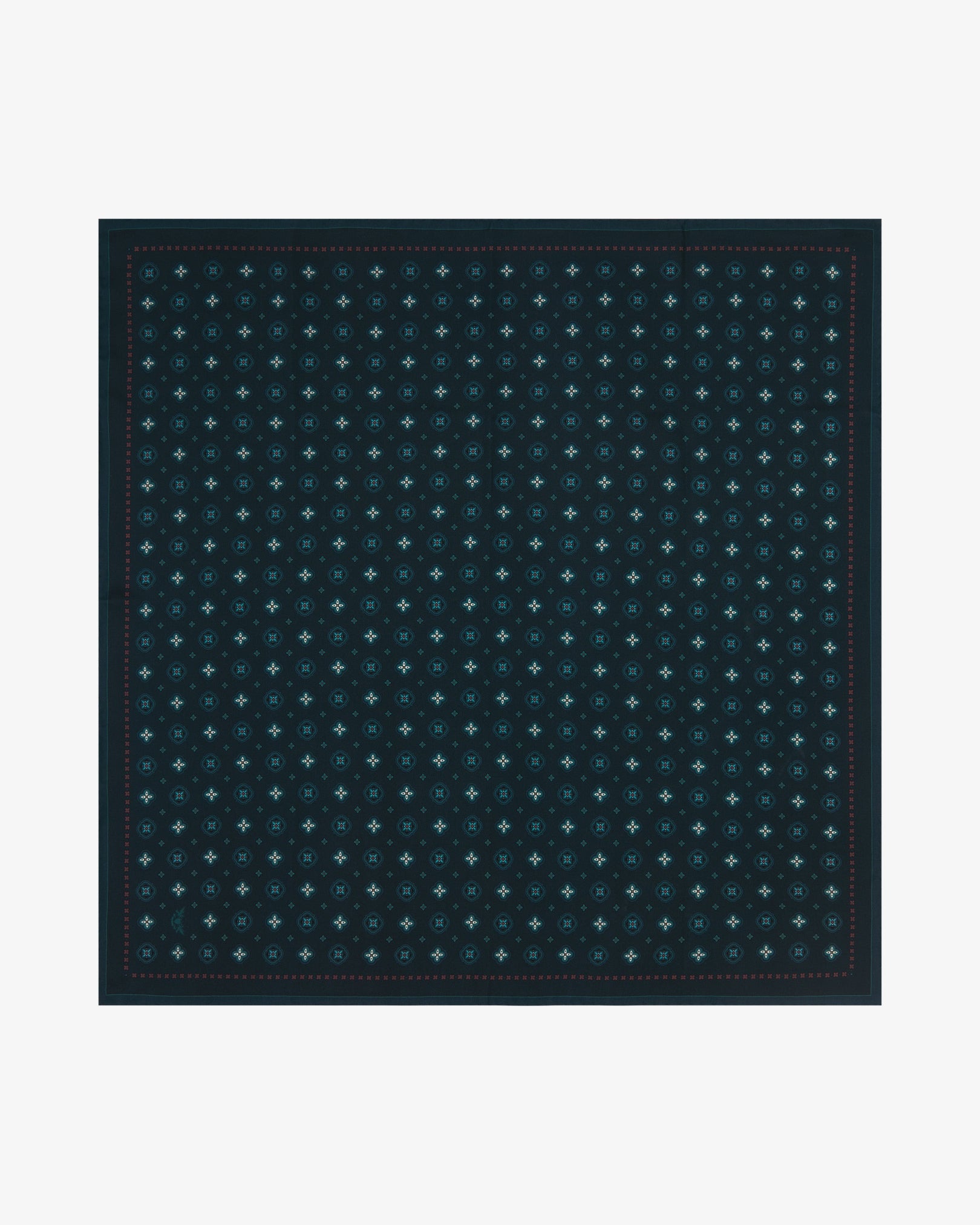 Fully unfolded 'Chelsea' silk neckerchief, clearly displaying a repeating geometric floral pattern on a deep indigo background, framed by a fine berry-red inner border and a deep teal outer border.