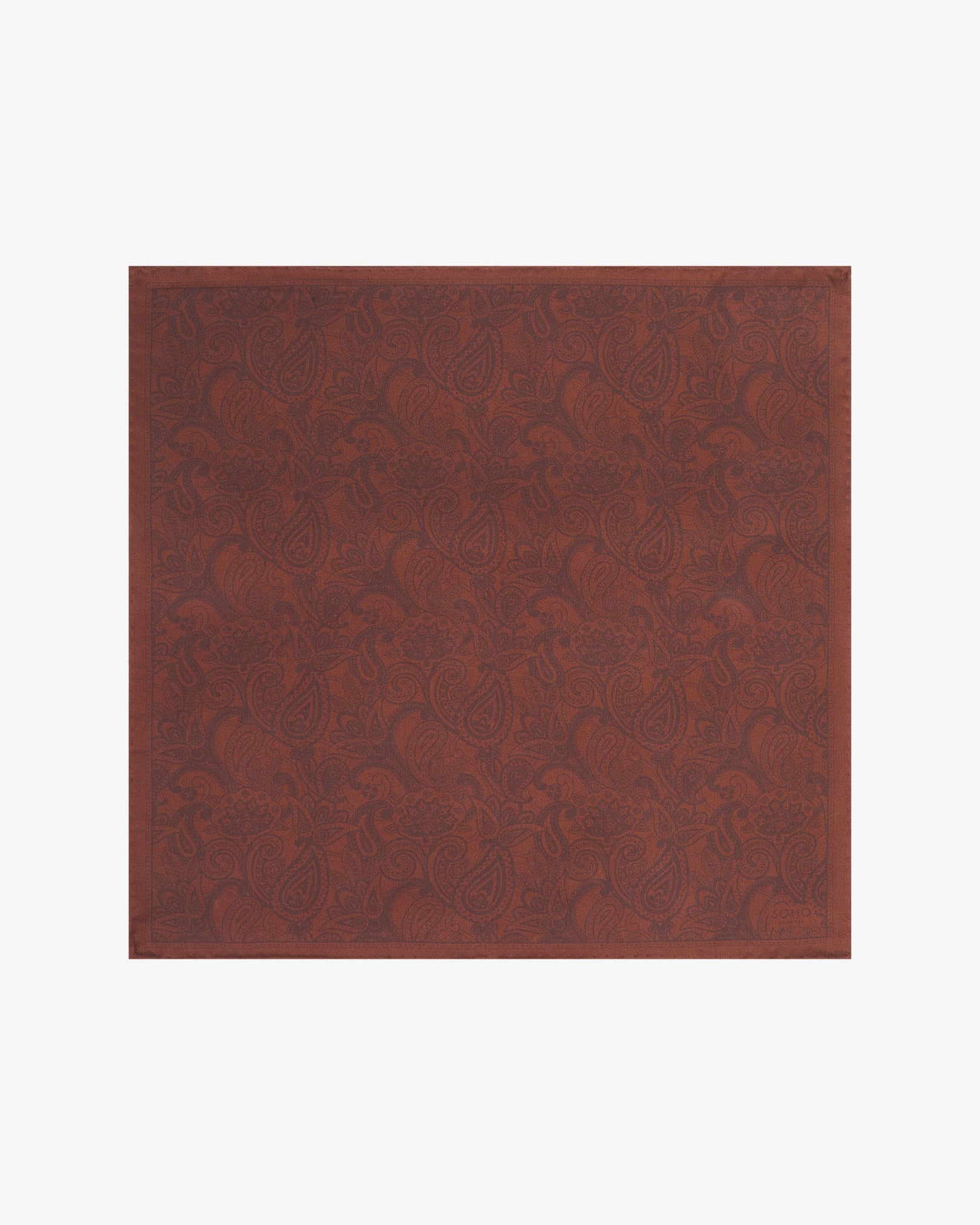 Fully unfolded cocoa silk pocket square from SOHO Scarves, displaying the rich brown paisley pattern woven throughout the fine silk fabric.