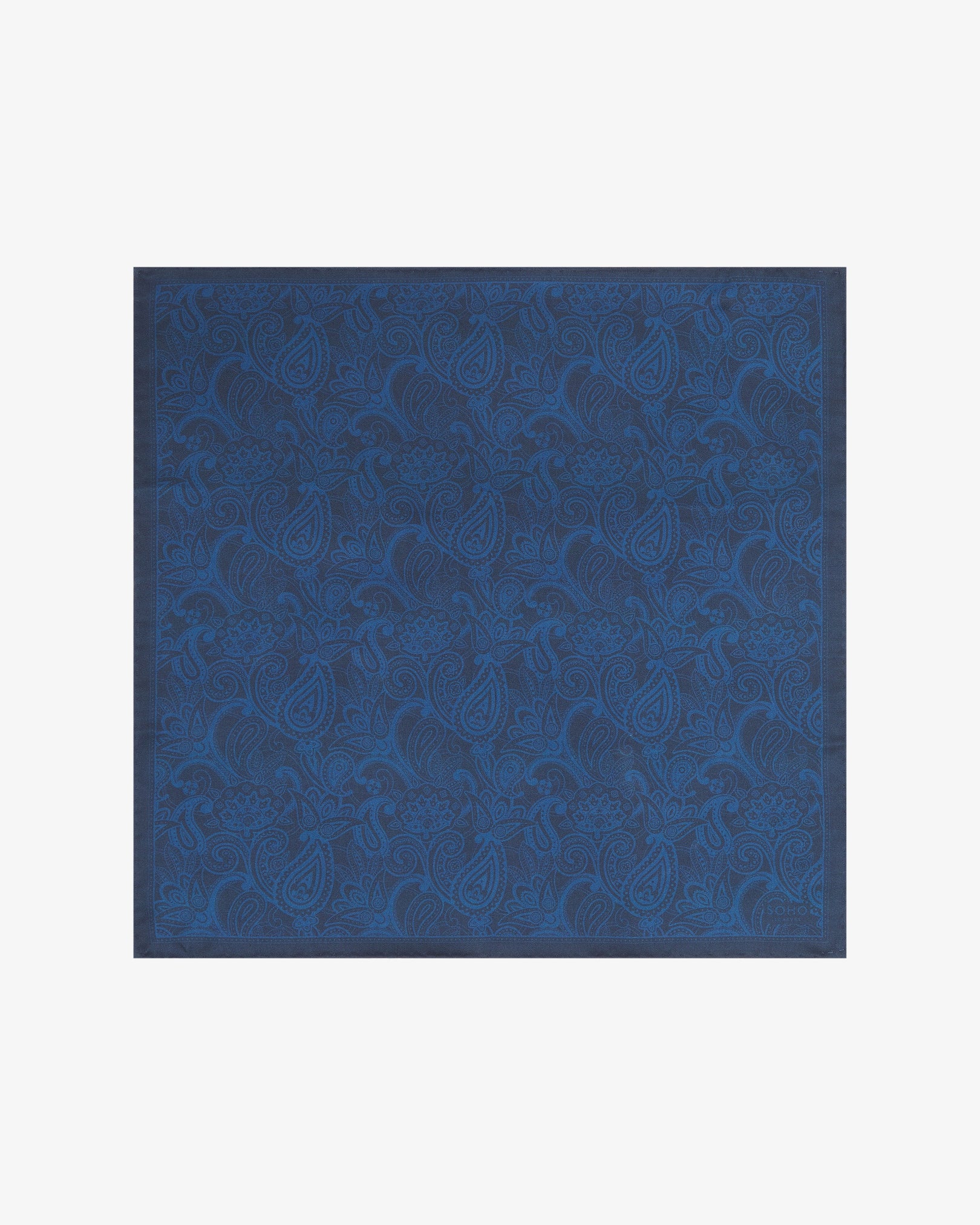 Fully unfolded navy blue silk pocket square from SOHO Scarves, showcasing the detailed paisley pattern and the smooth texture of the silk material.