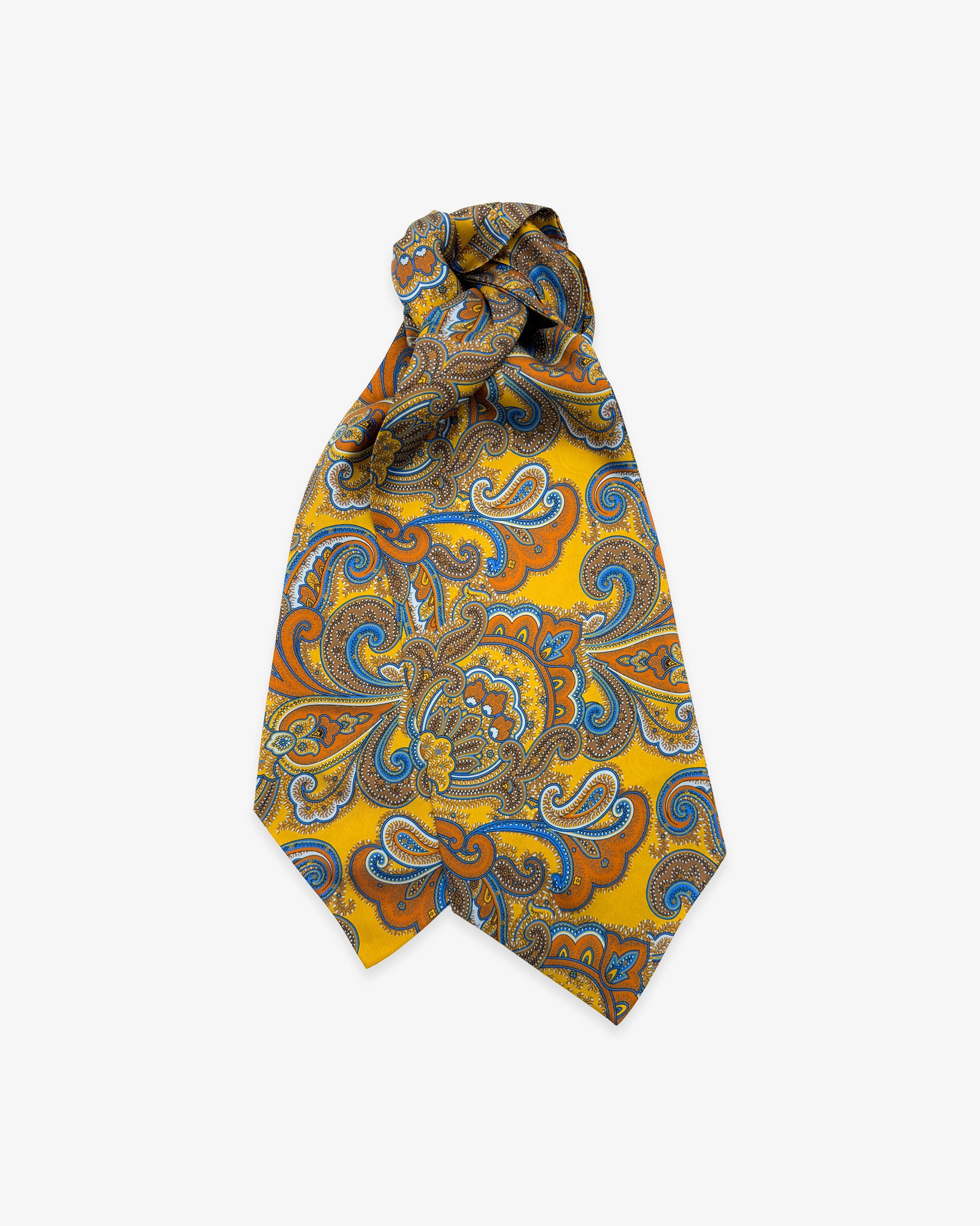 The Carnaby double Ascot tie with wide ends at the bottom and clear view of the blue patterns and cream-gold accents on a deep golden ground