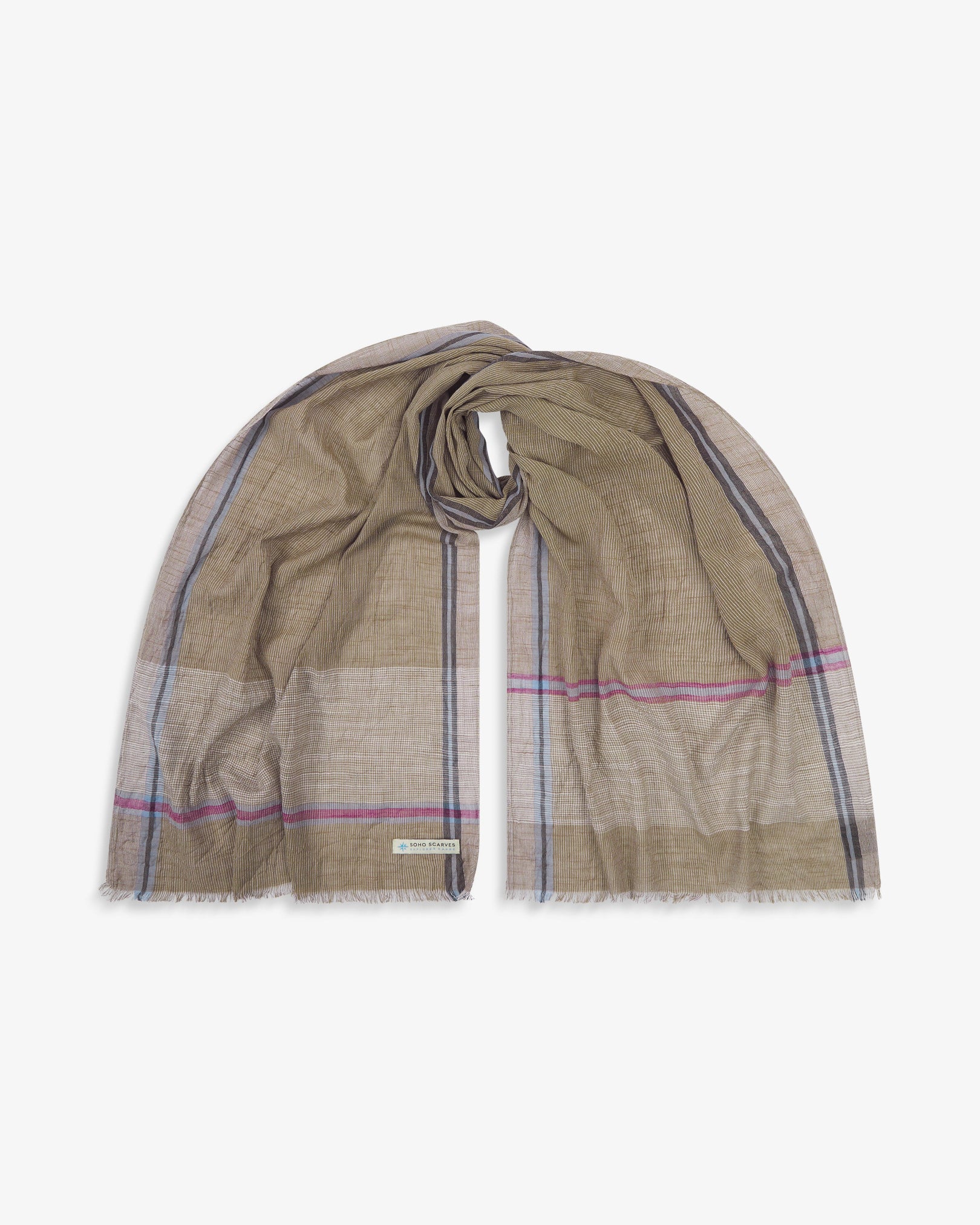 The 'Attenborough' cotton plaid scarf, looped in middle with both ends parallel. Displaying the loose striped pattern of tan, red and blue yarns and the SOHO Scarves Explorer Range branding logo in the bottom-left.