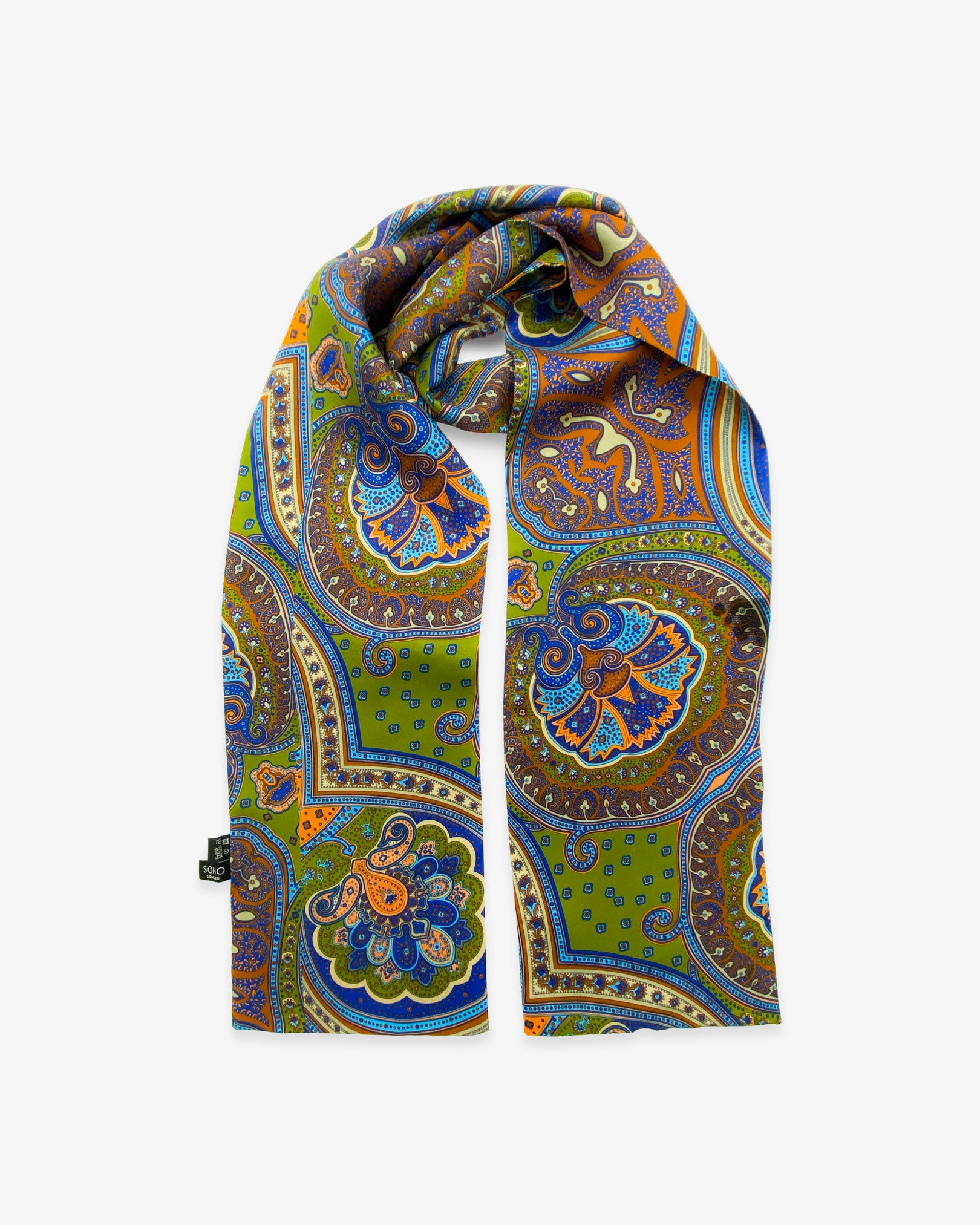 The Montreal pure silk, psychedelic scarf, looped in middle with both ends parallel. Clearly showing the multicoloured, intricate patterns with occasional hints of traditional paisley forms.