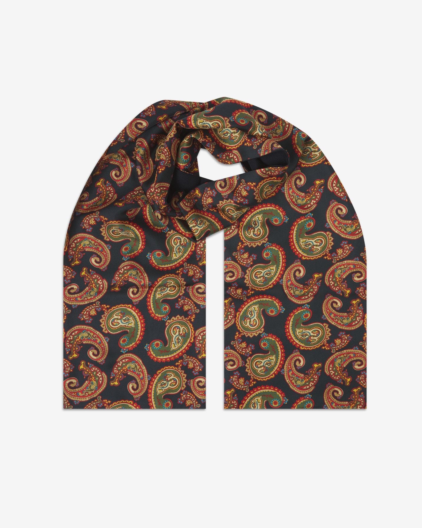 The Portland wool-backed silk scarf. Unravelled and looped in the middle, showing the length, width and paisley pattern on silk.