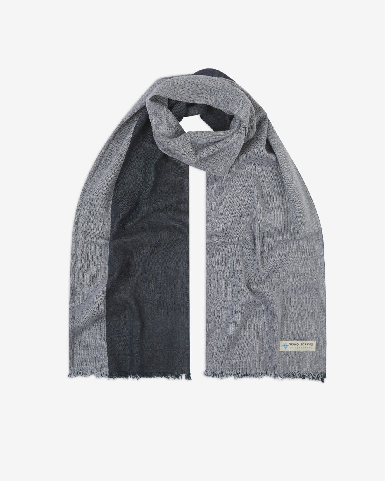 The 'Scott' cotton heathered scarf, looped in middle with both ends parallel. Displaying the two-tone monochrome heathered fabric and the SOHO Scarves Explorer Range branding logo in the bottom-right.