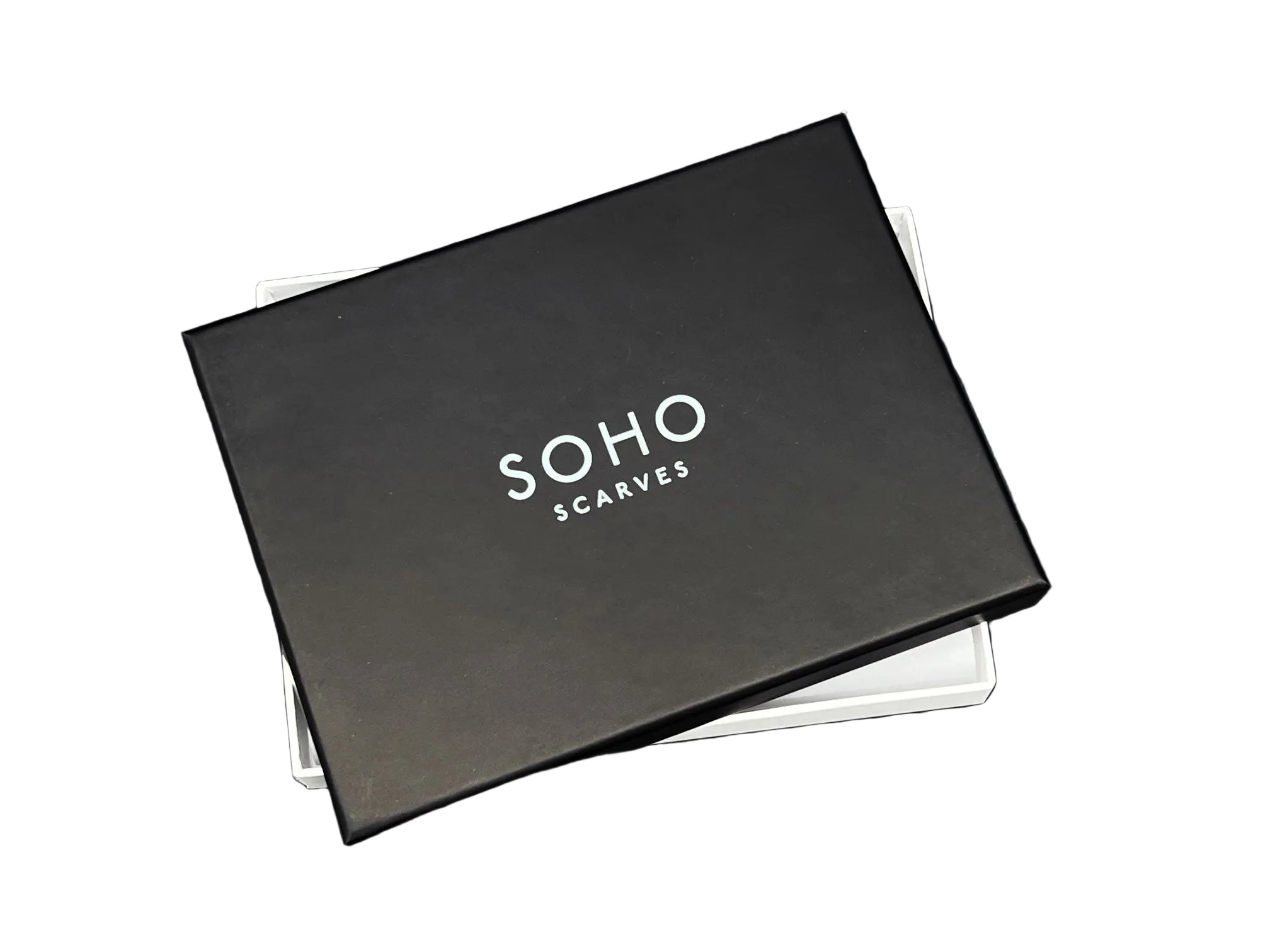 Small deluxe SOHO Scarves gift box. Black branded lid dislodged to reveal white inner box.