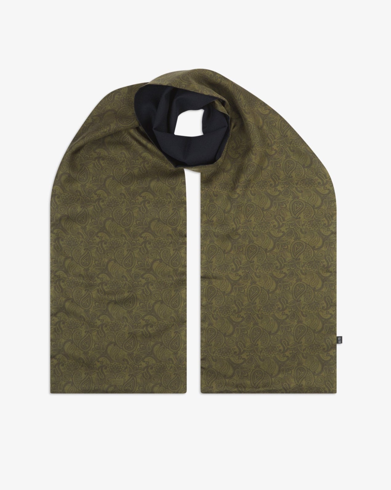 The 'Tonal Paisley' olive wool-backed silk scarf shown looped and draped to reveal the full length and subtle green paisley pattern on the silk face, with a glimpse of the dark wool underside.