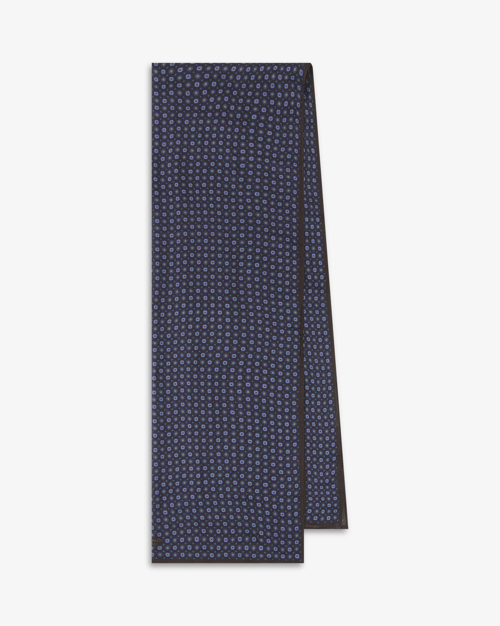 The Toshima 'Mahogany Daze' bohemian wide scarf folded and presented vertically to show the full dimensions and repeating stylised floral pattern in purple and blue on a rich mahogany brown background.
