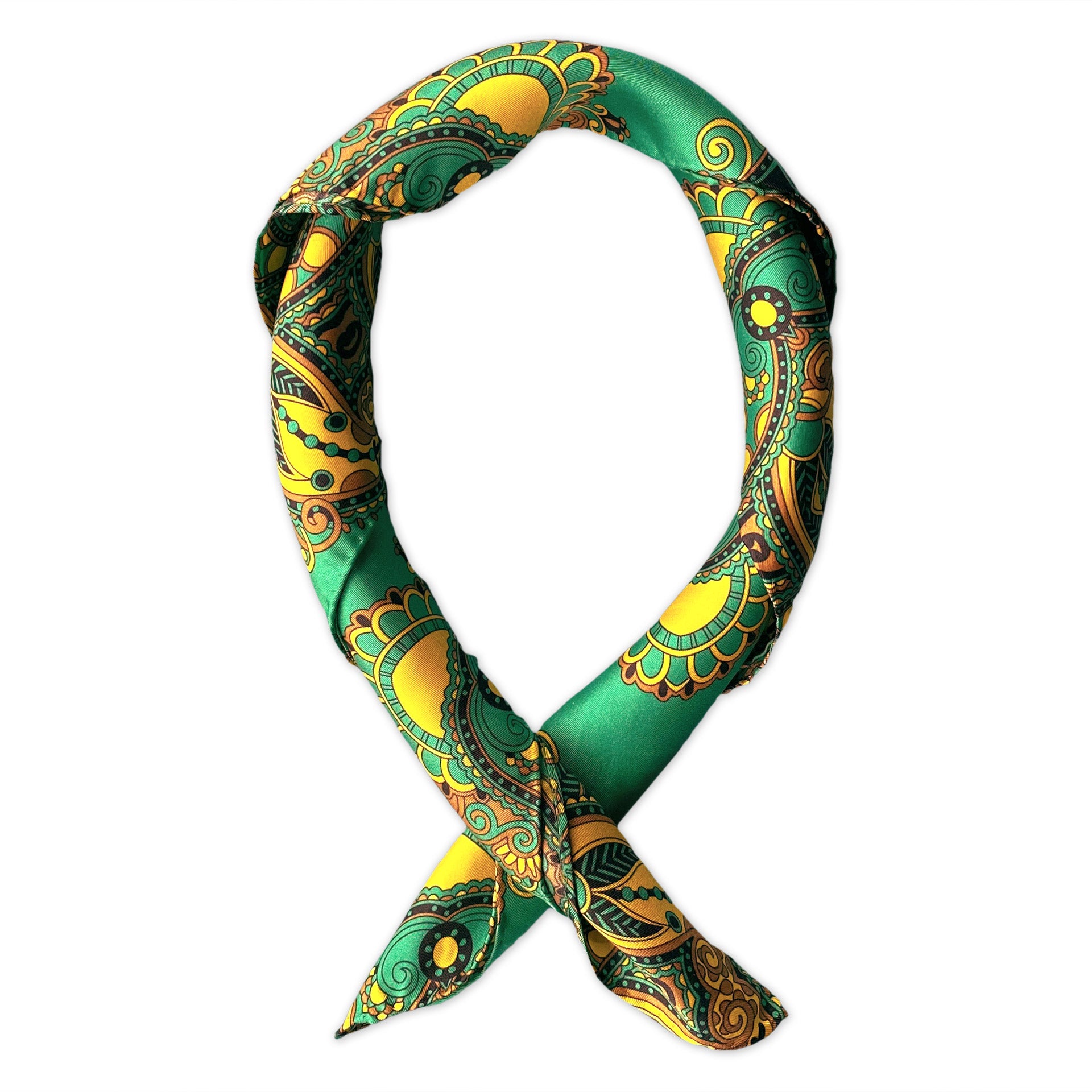Square scarf rolled into a loop, showing the sheen of the silk neckerchief fabric with gold and black Fleur de Lis patterns on a green ground.