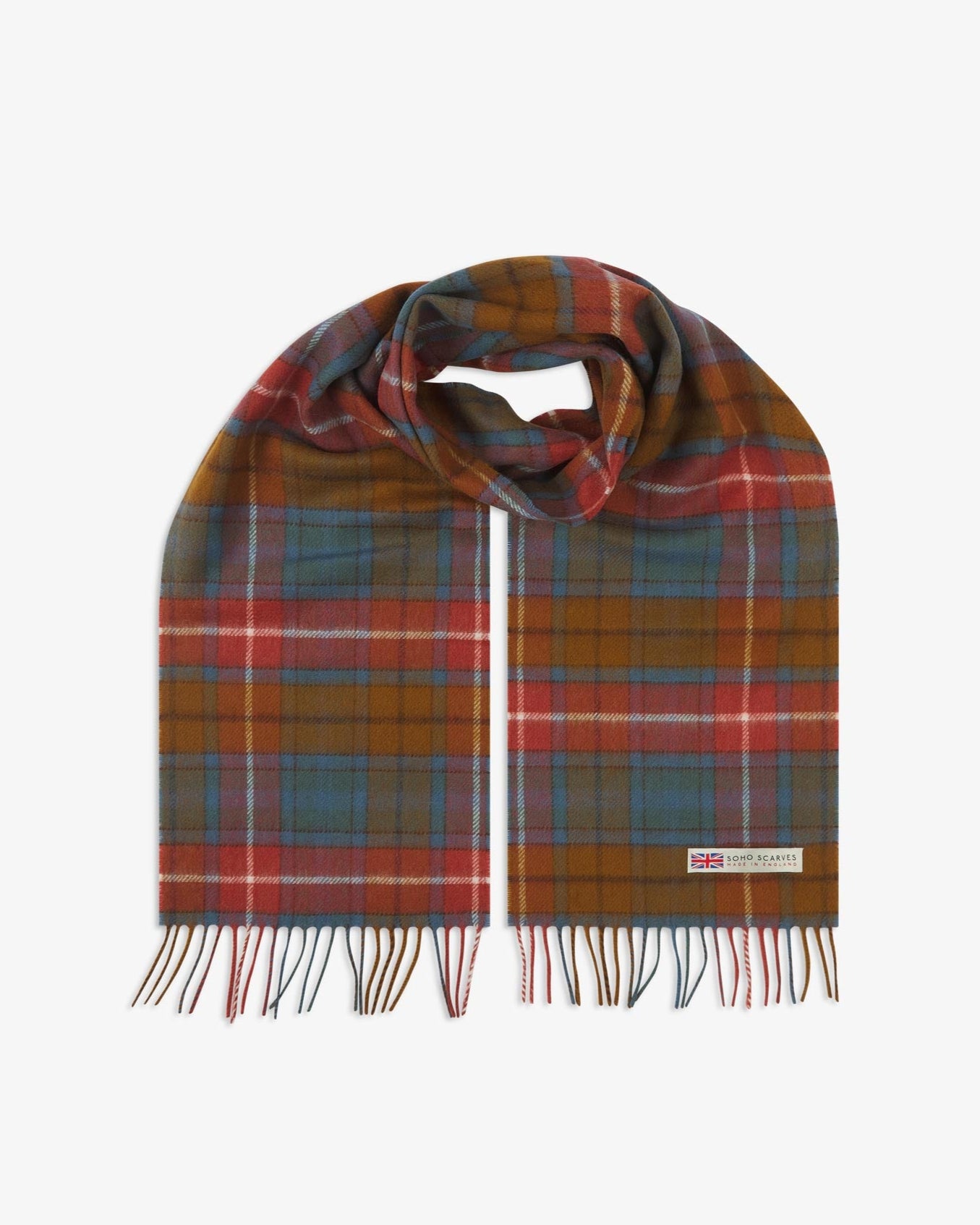 The 'Highlands tartan Antique Buchanan' scarf, looped in middle with both ends parallel showing the tan, rust-red, and blue patterns, fringing and SOHO Scarves logo with Union Jack motif.