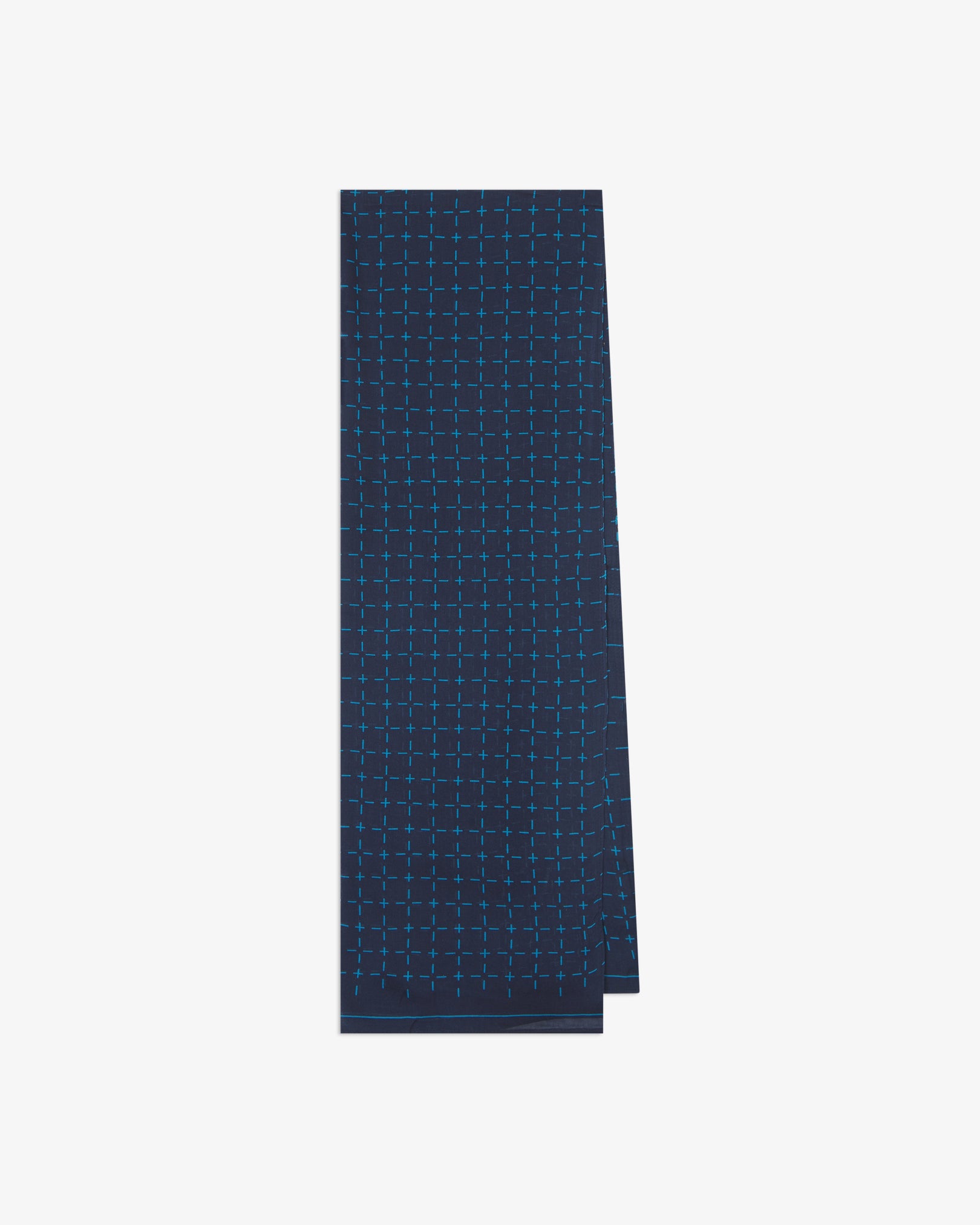 The 'Crosses' blue bohemian wide scarf from SOHO Scarves folded and presented vertically to show the full dimensions and repeating geometric grid pattern of light blue dashes and crosses on a navy blue background.