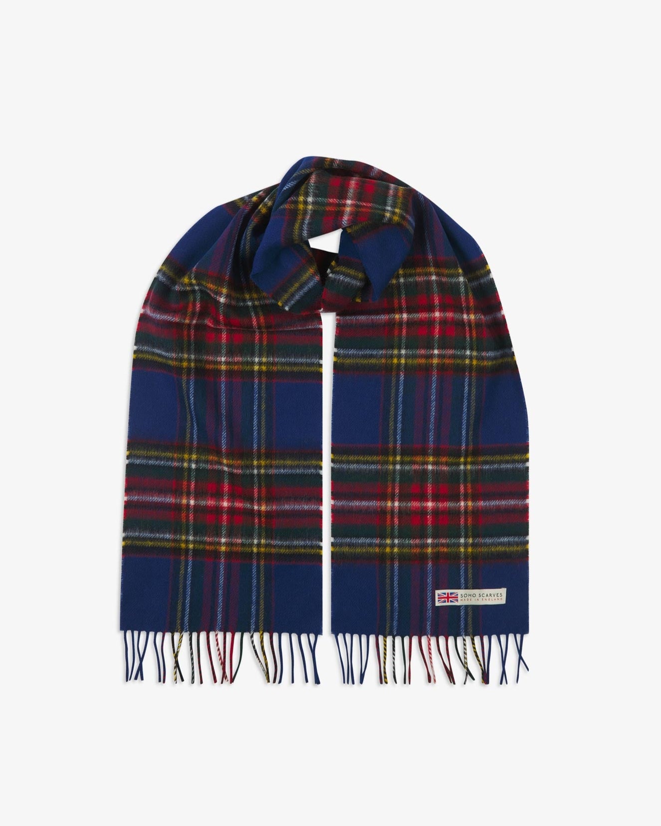 The 'Highlands' tartan in blue scarf, looped in middle with both ends parallel showing the red, yellow, white, and green patterns, fringing and SOHO Scarves logo with Union Jack motif.