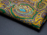 Focus on a corner point of 'The Kingly' paisley patterned square, showing the fine wool weave.