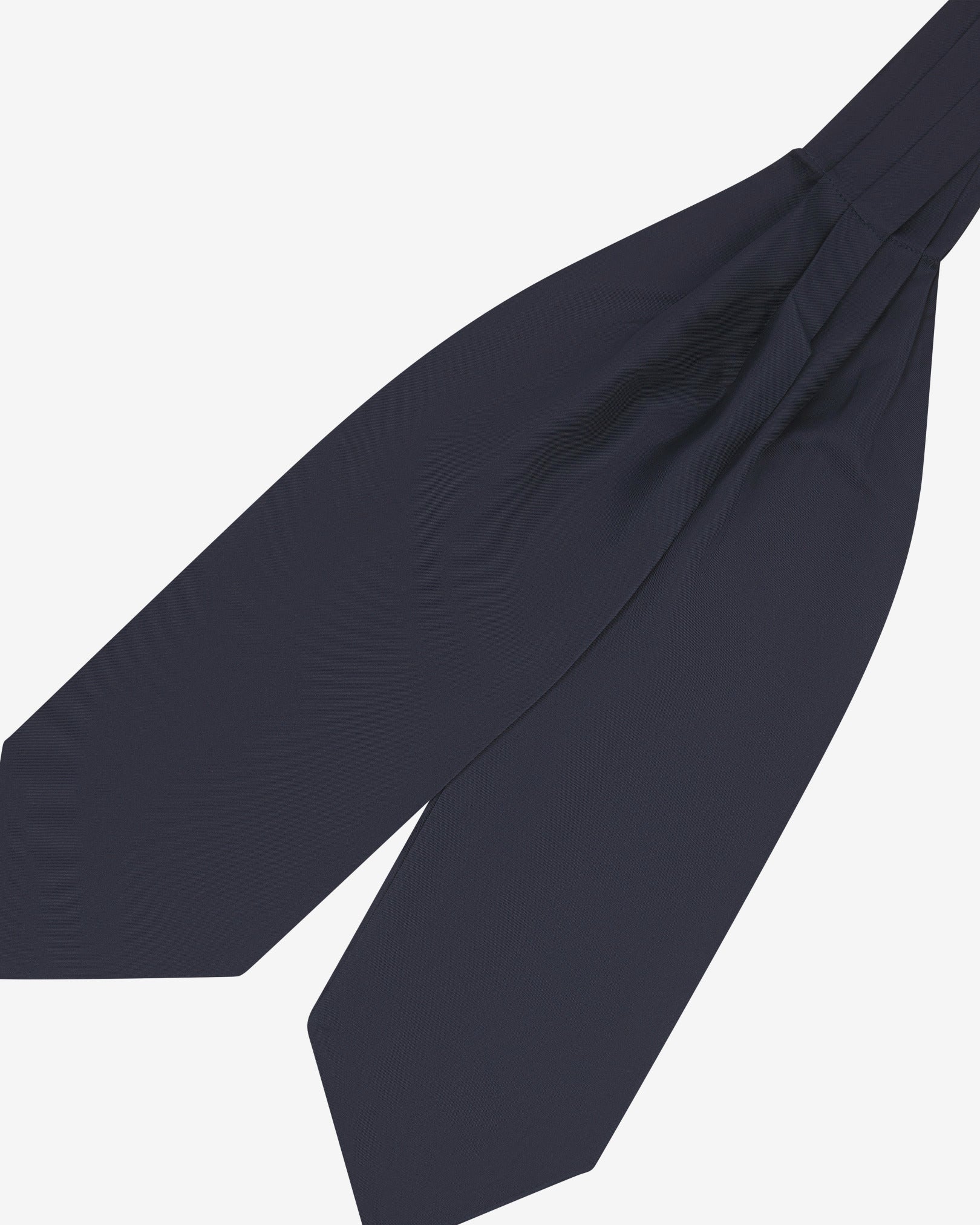 Angled view of the navy-blue silk double Ascot or cravat. Presented with wide ends pointing towards the bottom-left and slightly zoomed in to see the fine silk material.