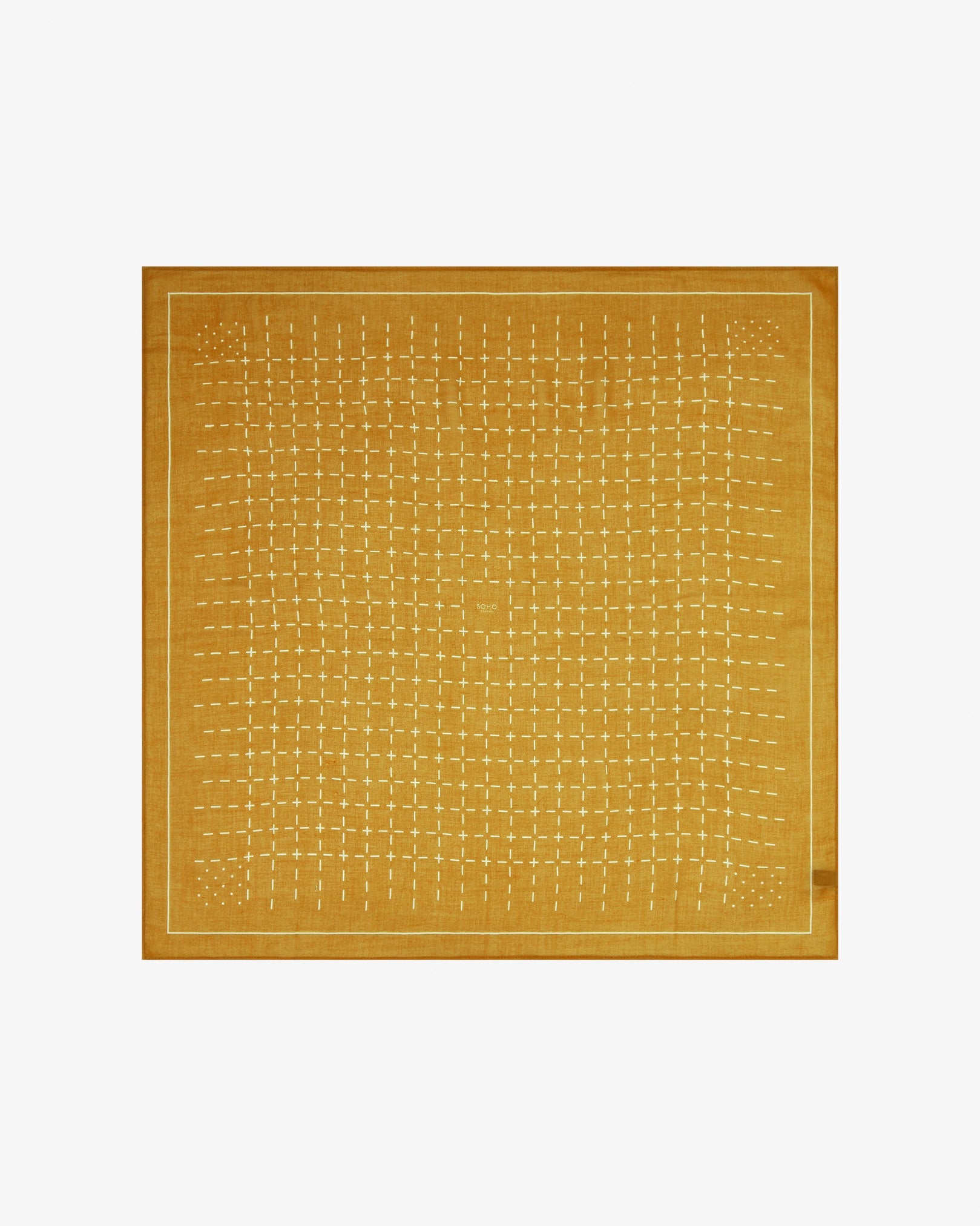 Fully unfolded 'Crosses in Dust' modal and wool bandana, displaying the complete repeating geometric grid pattern of dashes and crosses in warm dust tones framed by a wide border.