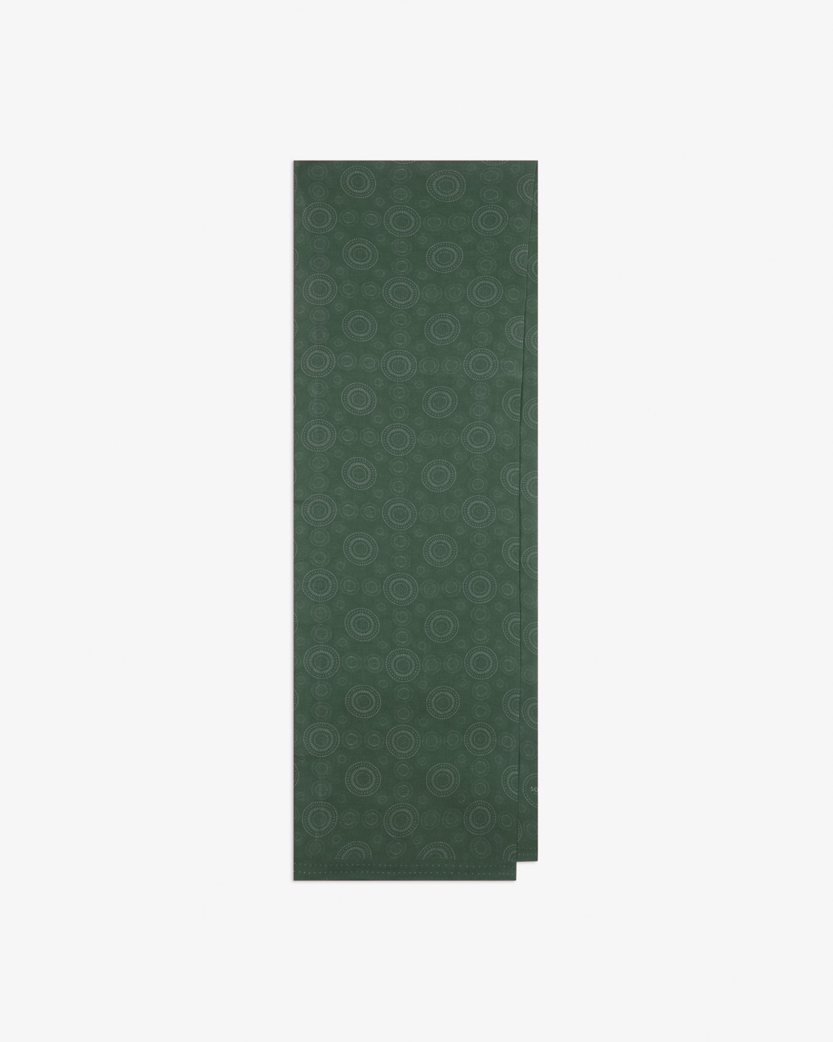 The 'Circles' evergreen bohemian wide scarf folded and presented vertically to show the full dimensions and repeating concentric Op art-inspired disc pattern in evergreen tones.