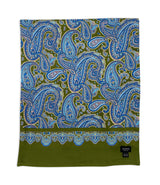 'The Abraham' wide silk-wool dress scarf arranged in a square shape, clearly showing the ornate border patterns and solid olive green border, along with the 'Soho Scarves' label in the bottom-right corner.