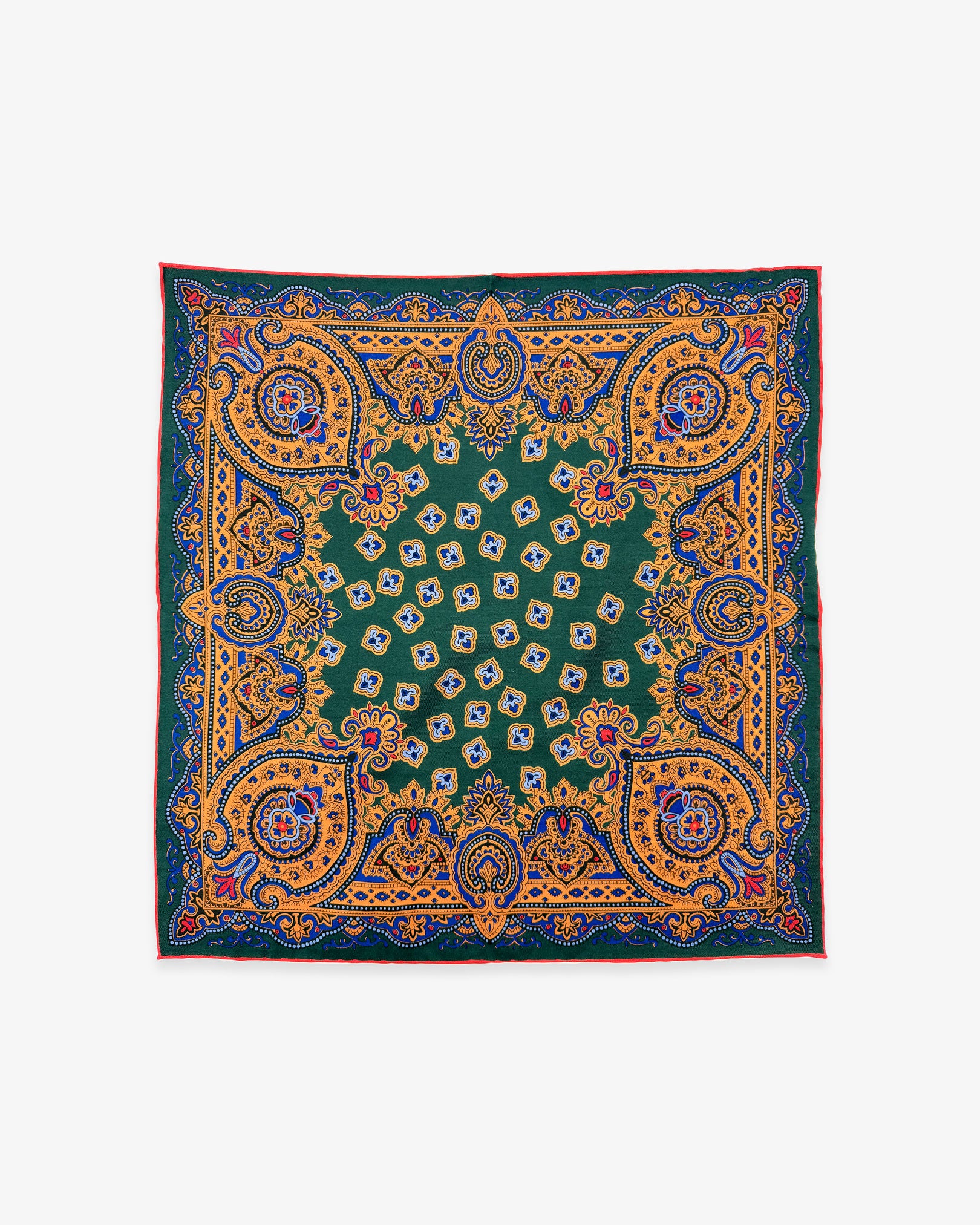Fully unfolded 'Abingdon' English madder silk pocket square, showing the exquisitely ornate green, gold and blue design of the stylised paisley, fleur-de-lis and medallion decoration.