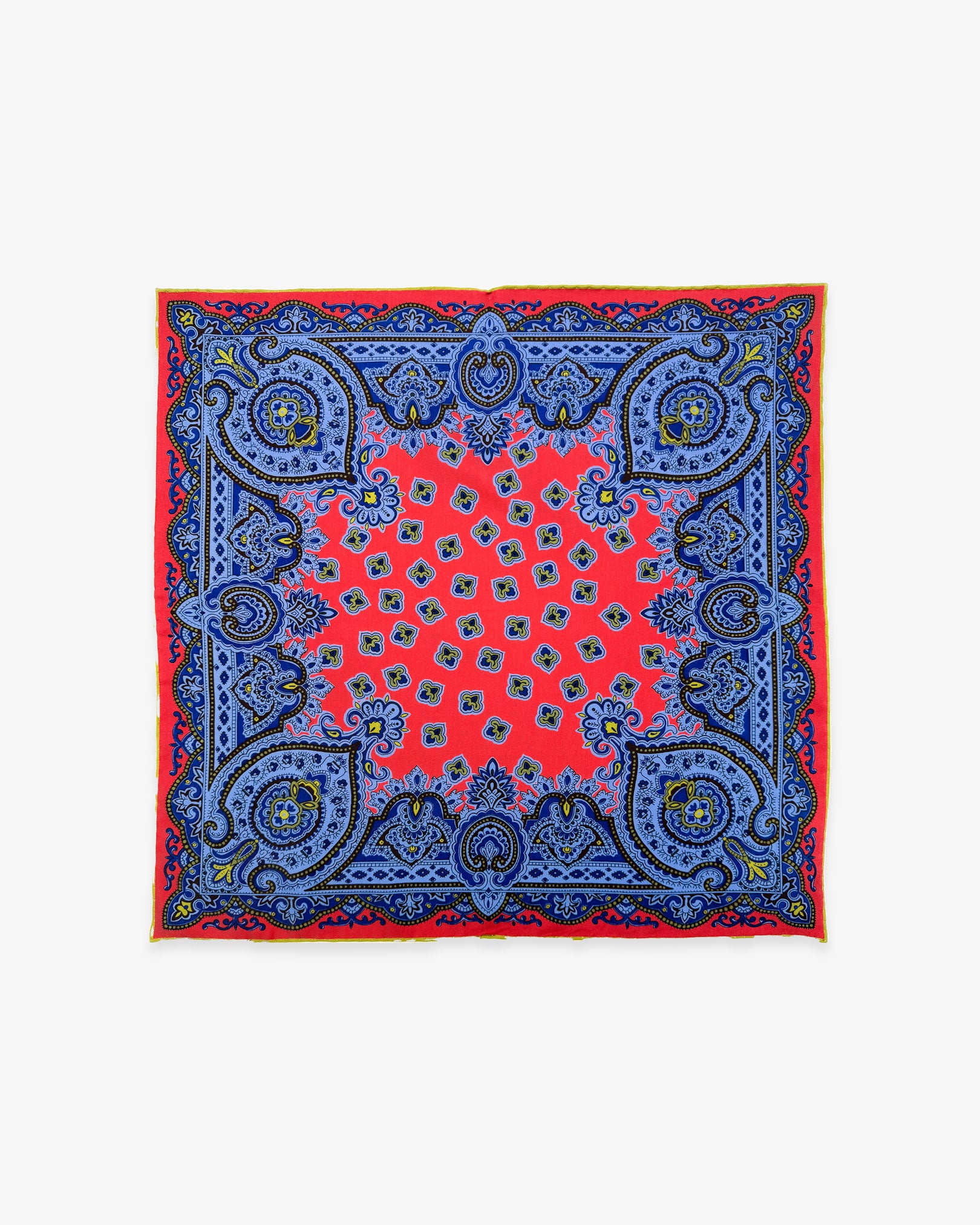 Fully unfolded 'Aldborough' English madder silk pocket square, showing the exquisitely ornate blue and red design with pale golden highlights.
