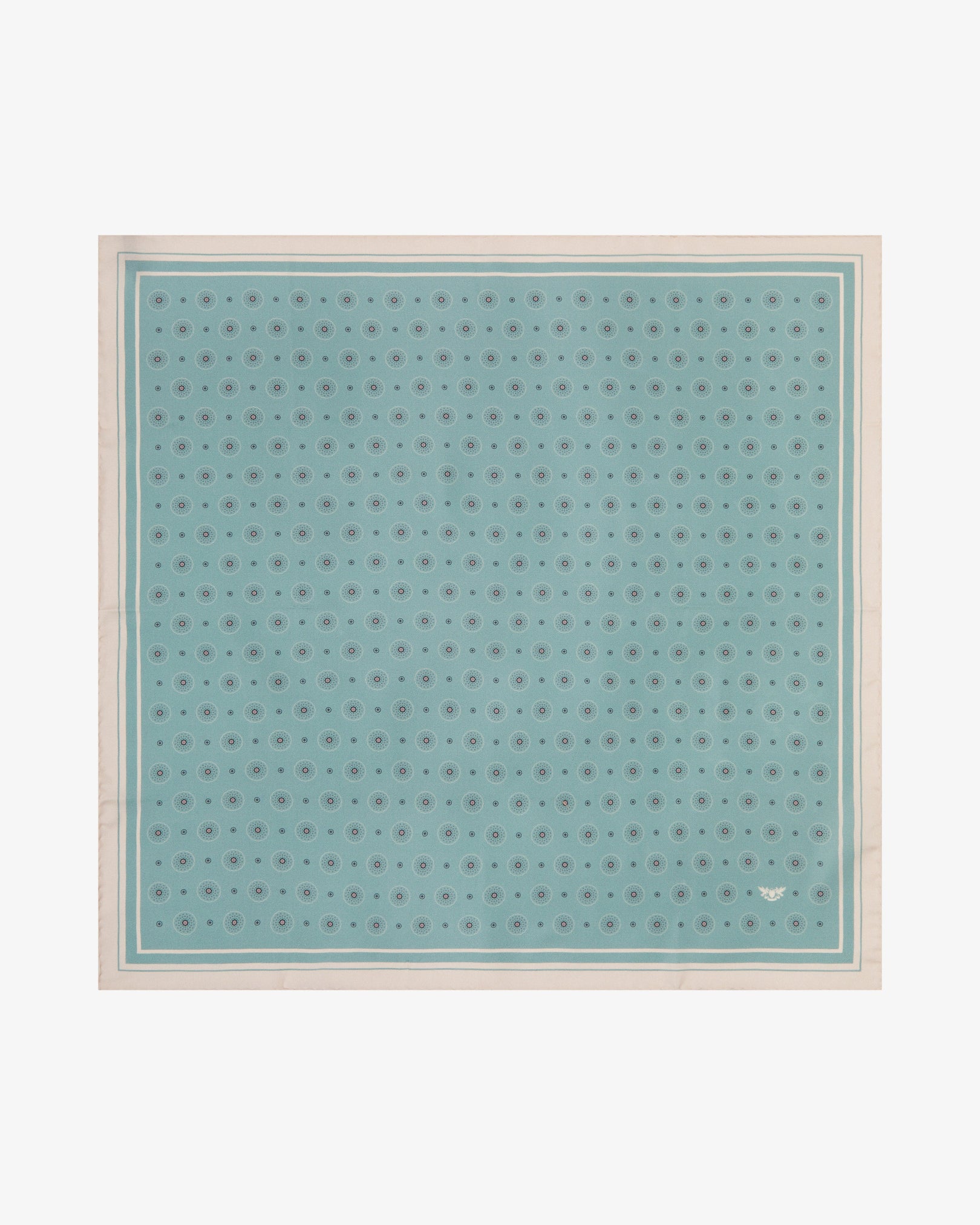 Fully unfolded 'Islington' silk neckerchief, revealing a repeating tonal geometric circle and sunburst pattern on a soft sage-mint background, framed by a slim teal inner border and a wide cream outer border.