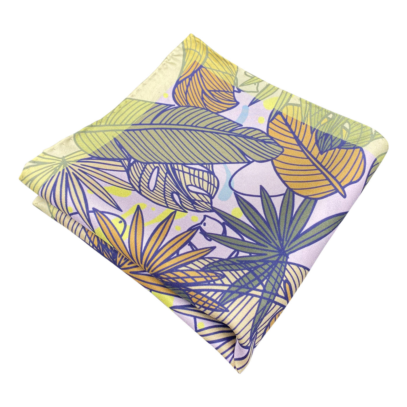 Folded 'Avon' silk pocket square from SOHO Scarves, showing the leaf montage pattern. Placed on a light background.