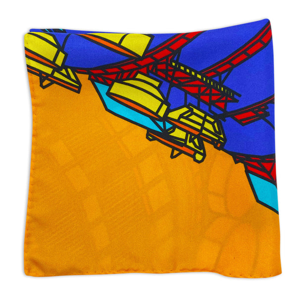 Mustard version of the BT Tower multicoloured pattern pocket square folded and arranged in a square shape showing a close-up of the tower motif and mustard background.