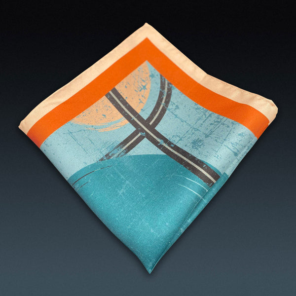 Folded 'Trent' silk pocket square from SOHO Scarves, showing the attractive abstract pattern.