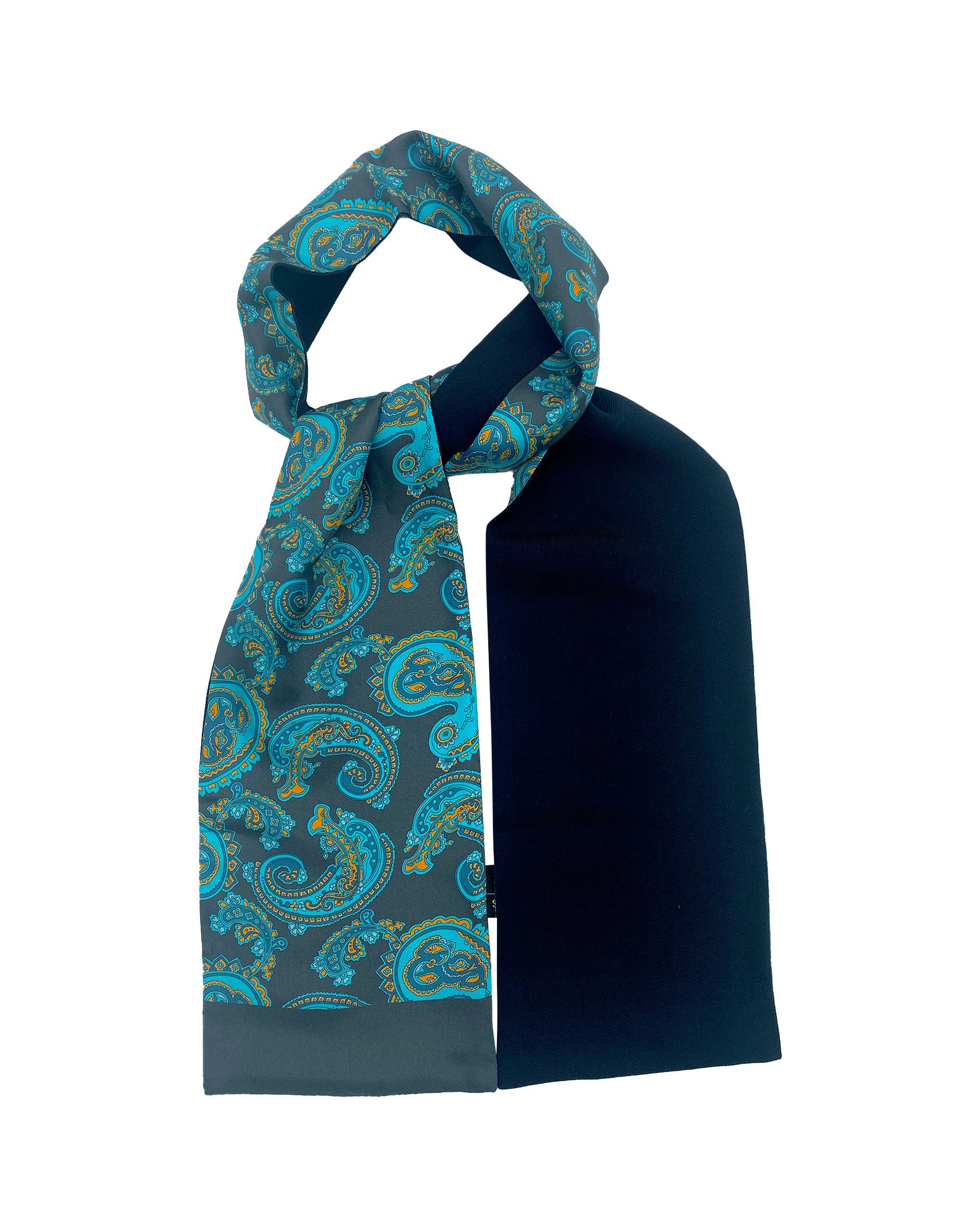 The Bridle wool-backed silk scarf looped and knotted, demonstrating the length, width, pattern on silk and the fine woollen underside.