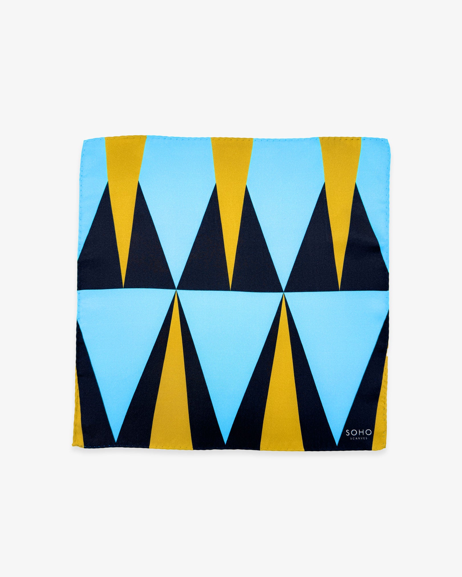 Fully unfolded 'Leipzig' silk pocket square, showing the full design of triangular shapes in pale blue, charcoal grey and yellow.