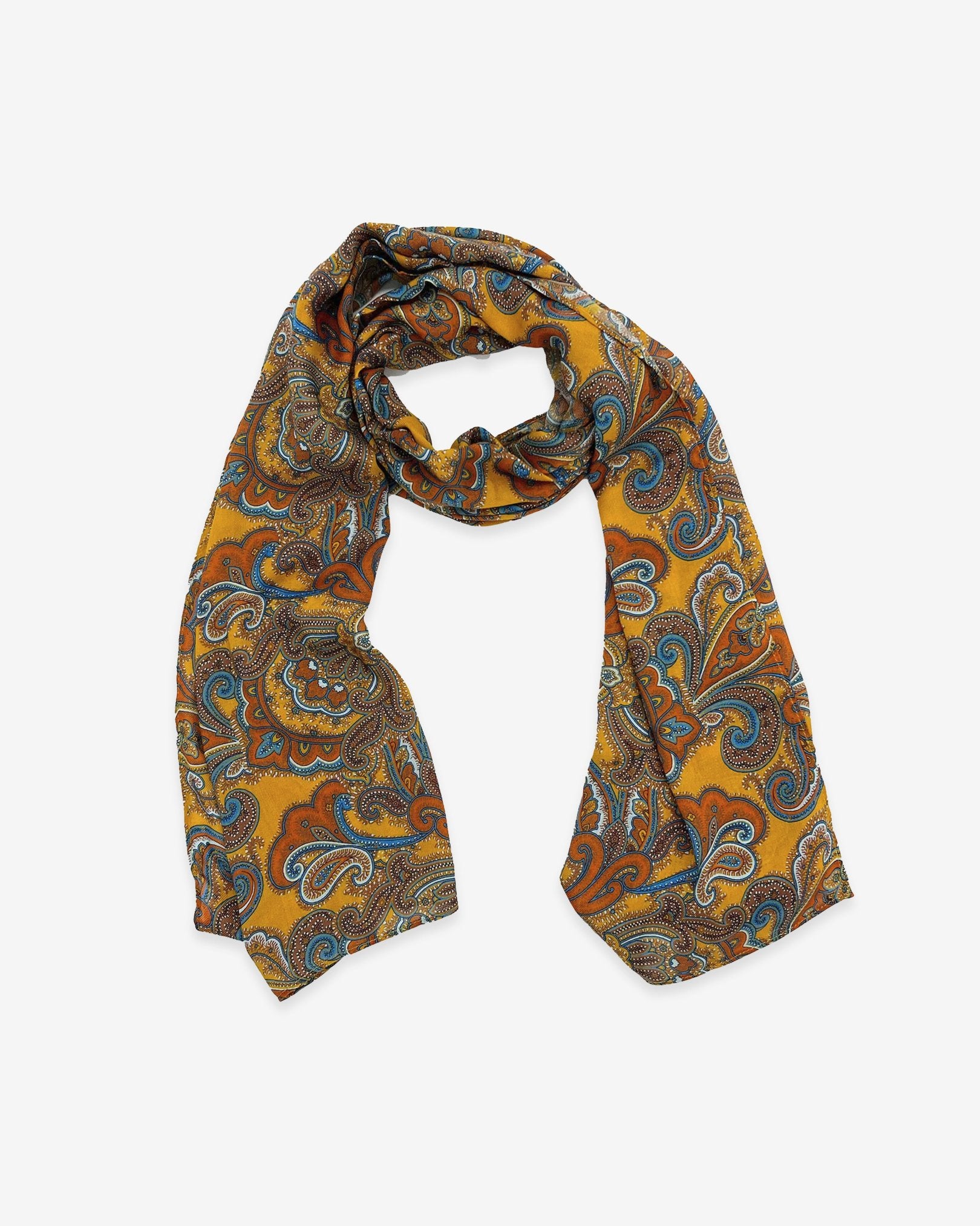 The Carnaby wide scarf unravelled and looped in the middle, demonstrating the considerable length and showing the paisley patterns on a golden ground.