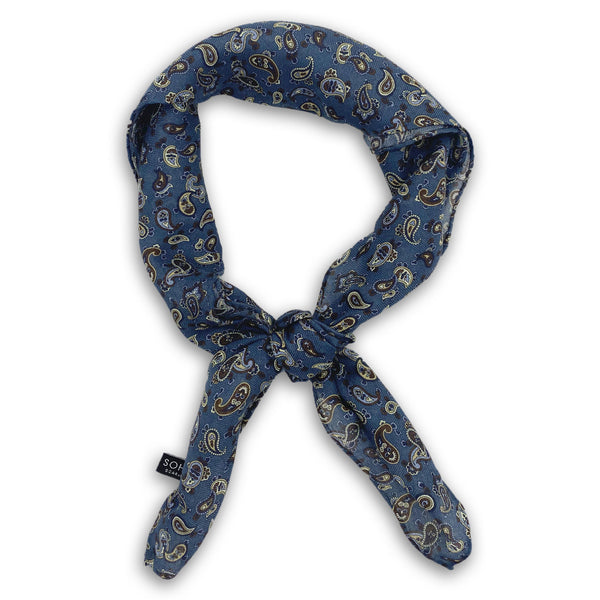 The Banff bandana knotted into a loop, showing the modal and wool fabric and intricate paisley patterns.