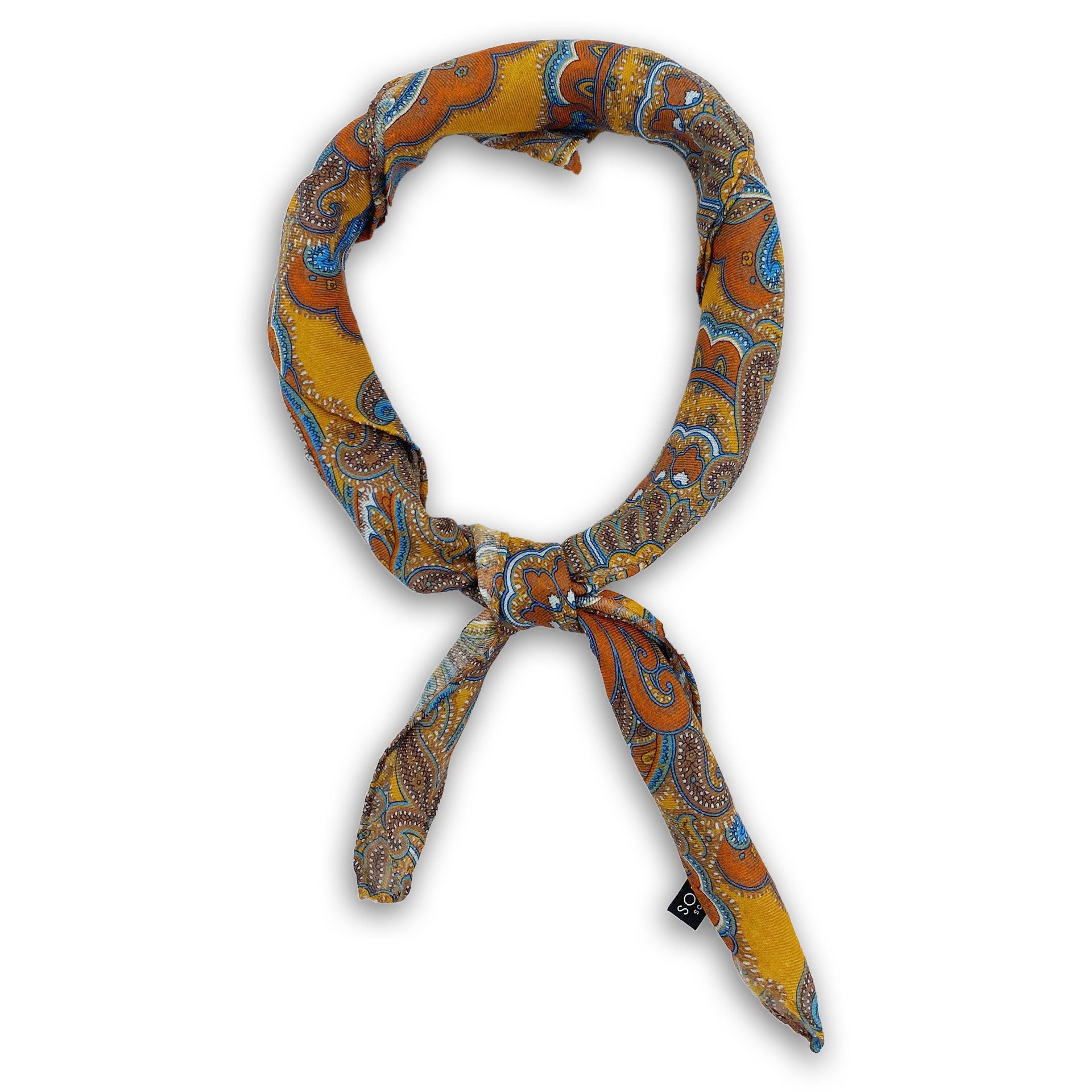 'The Carnaby' orange, brown and blue paisley patterened bandana on a gold-yellow background. Knotted into a loop on a white background.