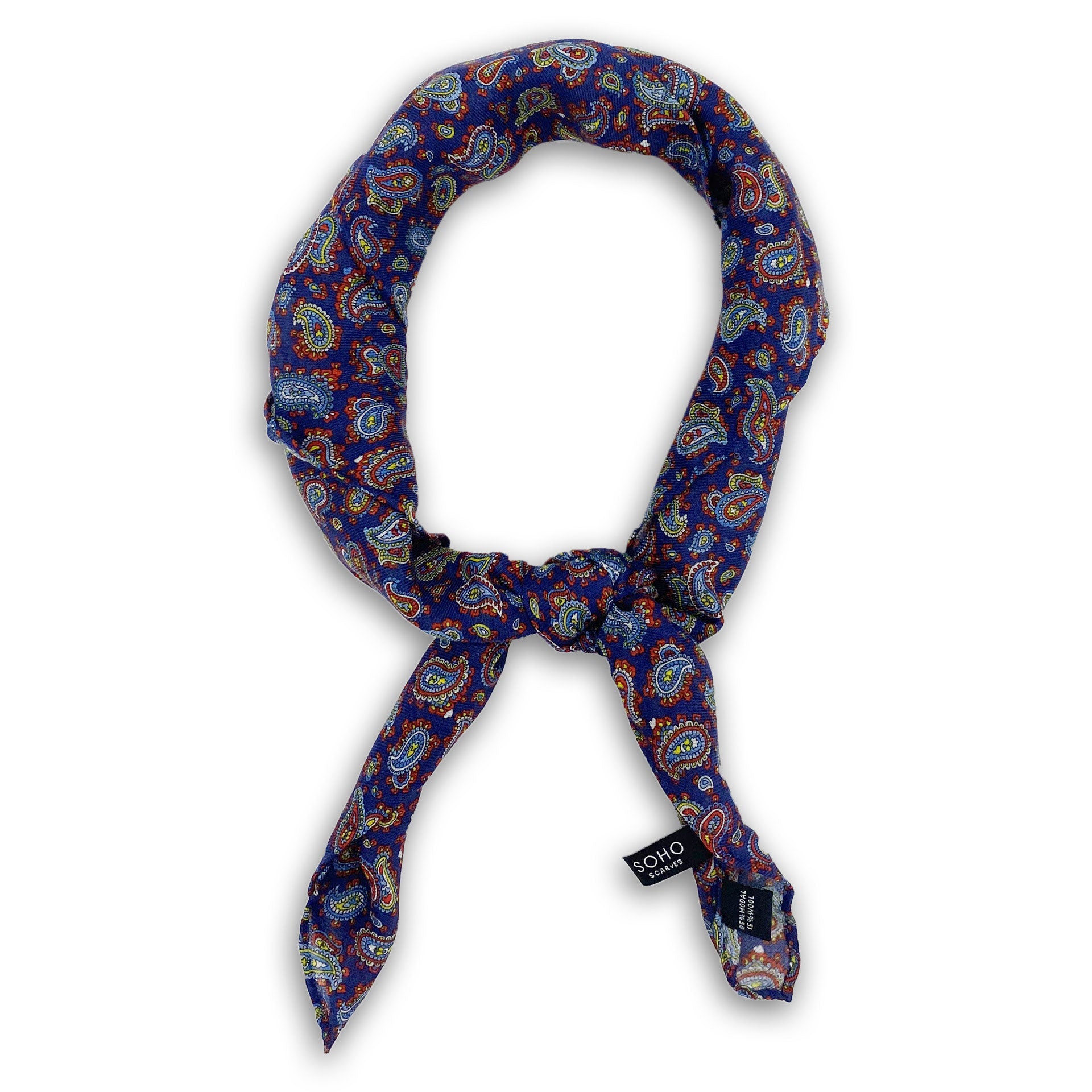 'The Lexington' light blue, gold and white paisley patterned bandana on a dark purple-blue background. Knotted into a loop on a white background.