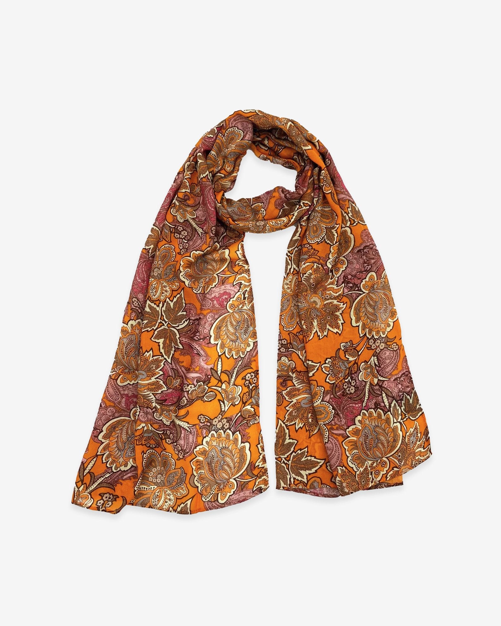 The Niagra wide scarf unravelled and looped in the middle, demonstrating the considerable length and showing large orange and pink floral patterns.