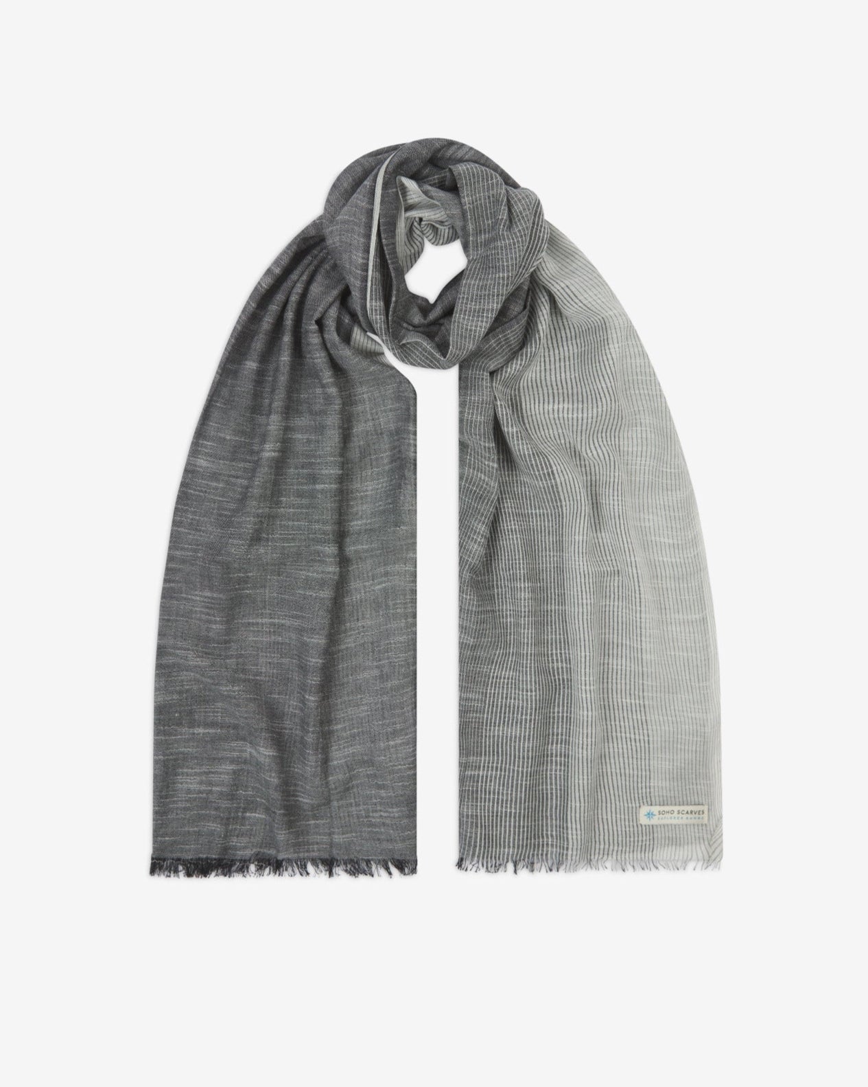 The 'Bonington' cotton monochrome scarf, looped in middle with both ends parallel. Displaying the gradient pattern of dark to light grey and the SOHO Scarves Explorer Range branding logo in the bottom-right.
