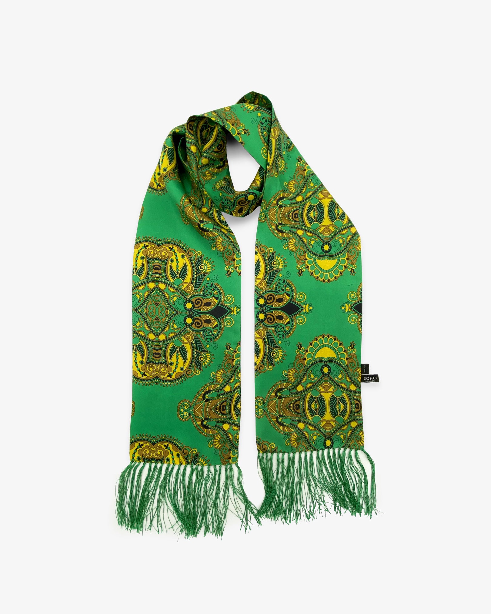 The Forks pure silk aviator scarf looped in middle with both ends parallel, showing paisley-inspired patterns on an emerald-green ground