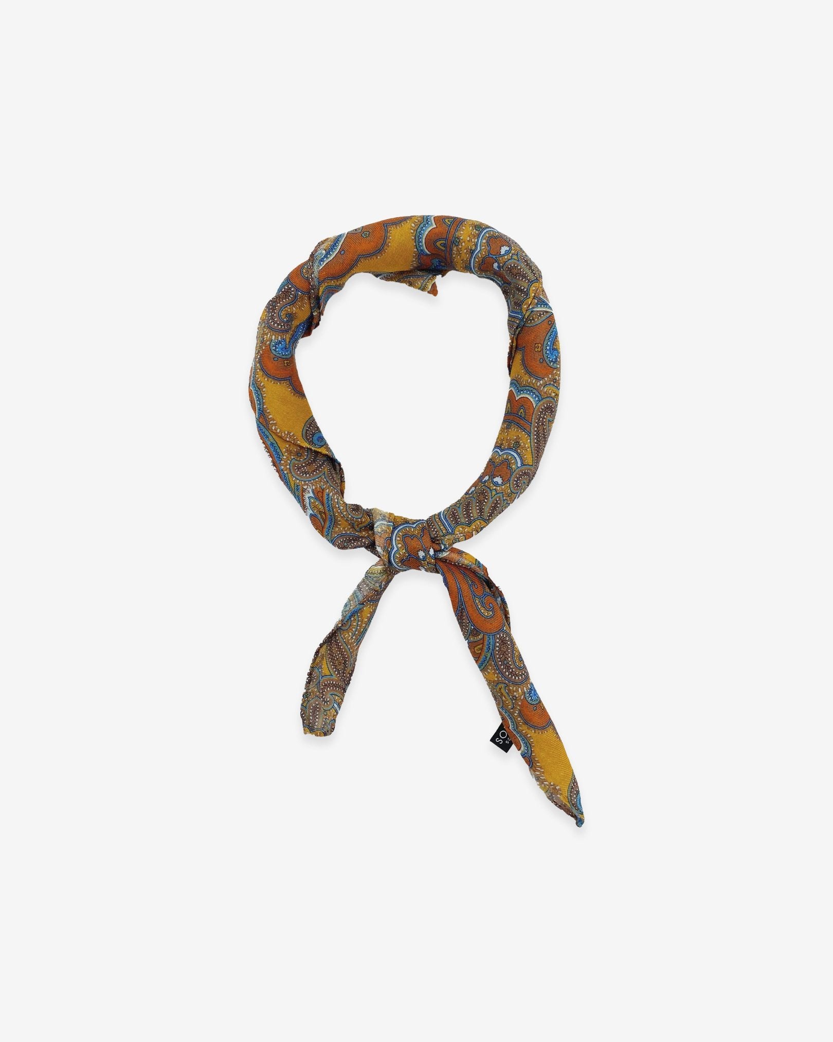 'The Carnaby' orange, brown and blue paisley patterened bandana on a gold-yellow background. Knotted into a loop on a white background.