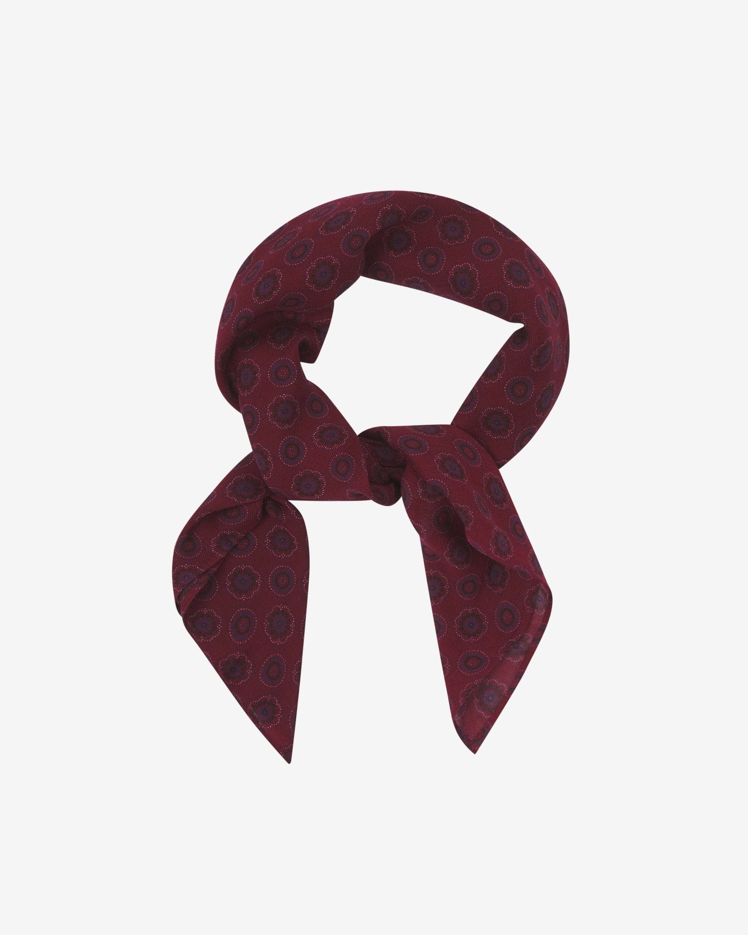 'The Seattle' burgundy and blue disc patterned bandana. Knotted into a loop on a white background.