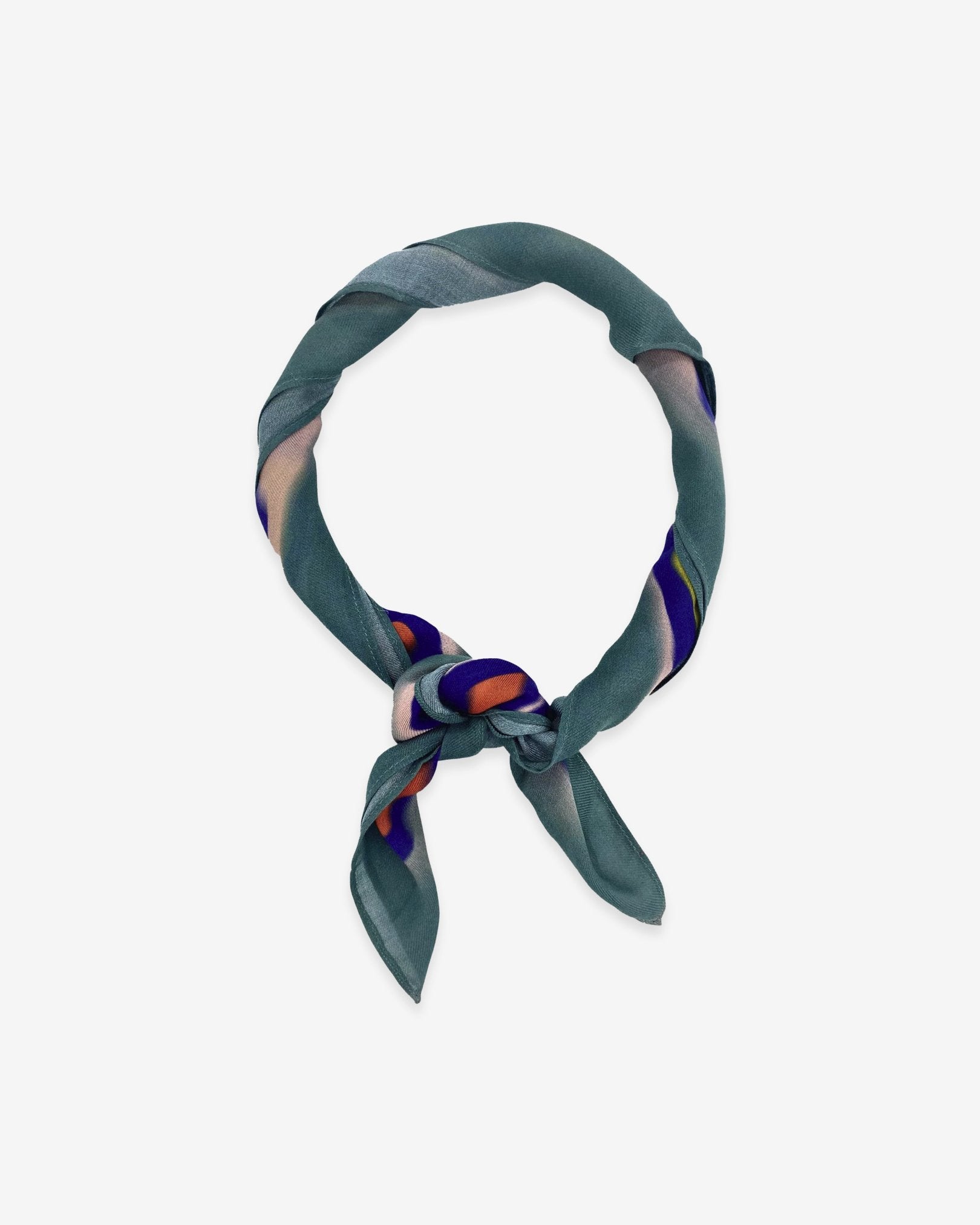 The Cascade bandana knotted into a loop, showing the brightly coloured modal-wool fabric.