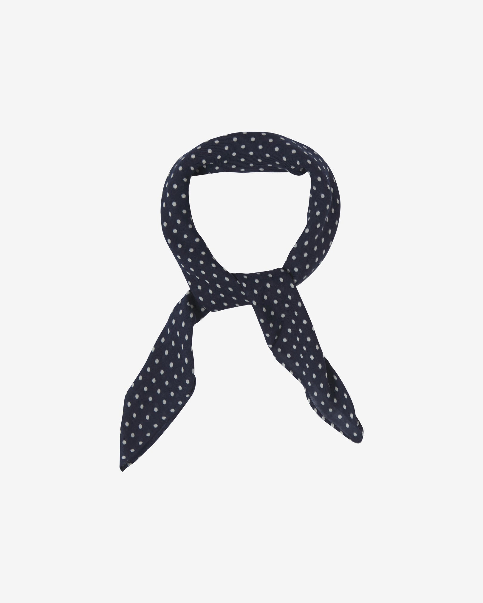 The Westminster bandana knotted into a loop, showing the attractive white polka dot pattern against a navy blue ground.