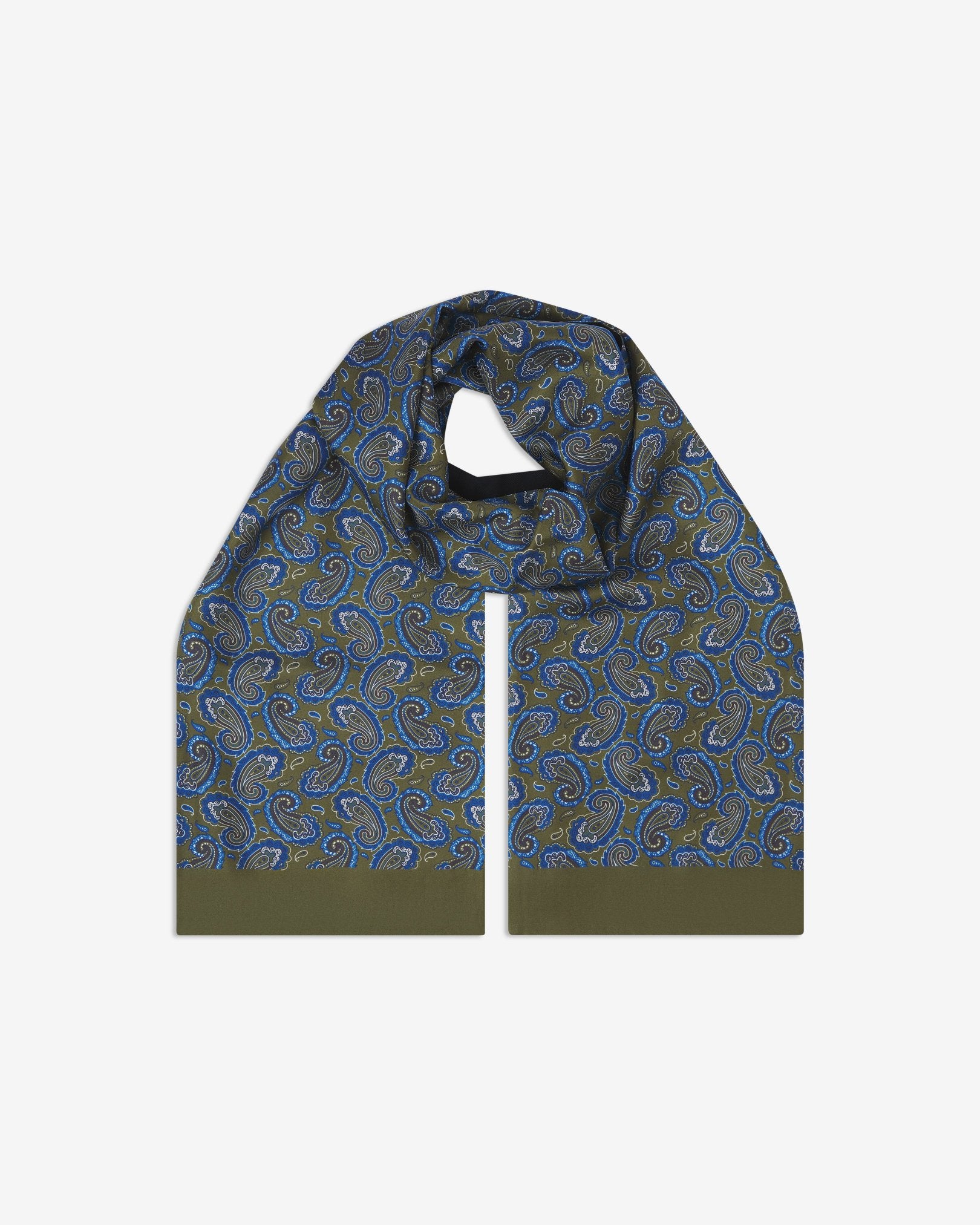 The Malibu wool-backed silk scarf. Unravelled and looped in the middle, showing the length, width and paisley pattern on silk.