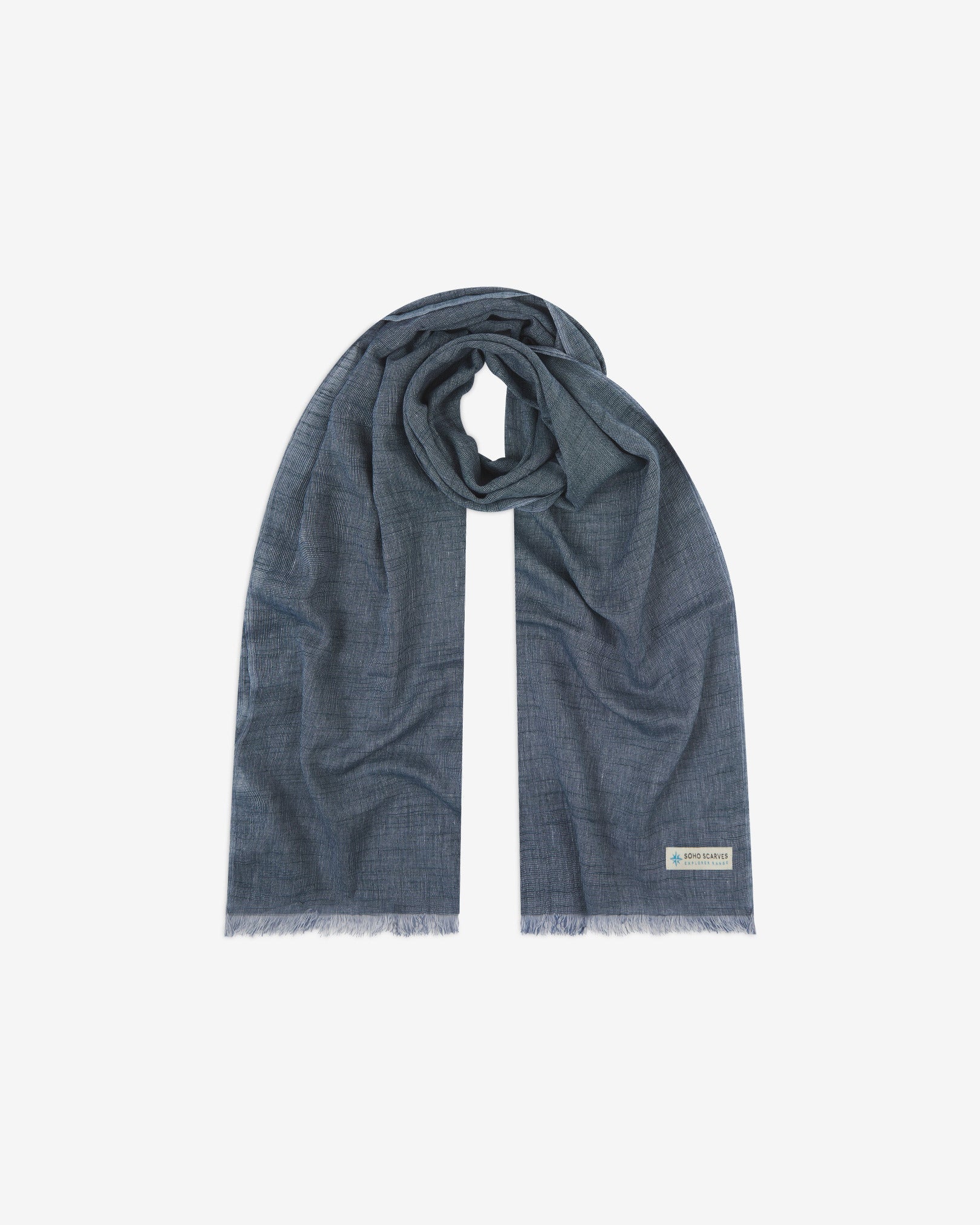 The 'Sharman' cotton heathered scarf, looped in middle with both ends parallel. Displaying the dull blue heathered fabric and the SOHO Scarves Explorer Range branding logo in the bottom-right.