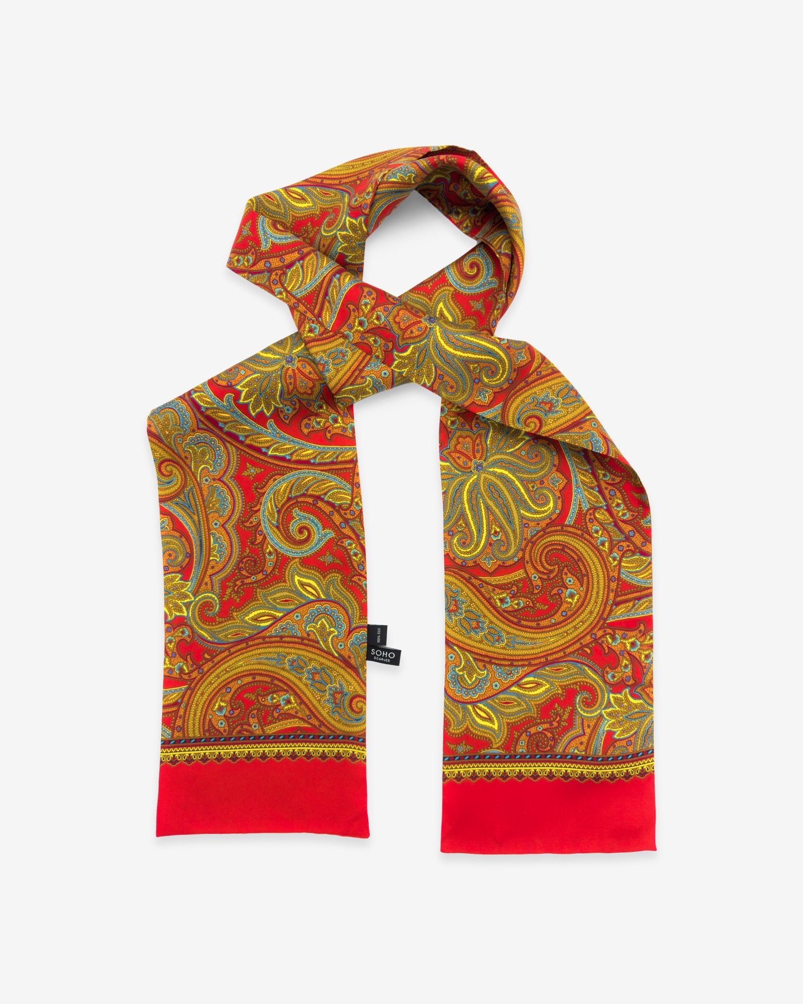 The Victoria pure silk scarf looped in middle with both ends parallel showing the blue, gold and pink paisley patterns nd the ornate, decorative border.