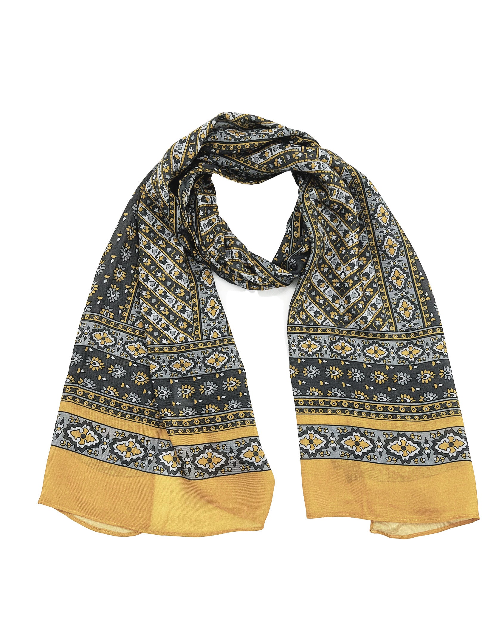 The Whitehorse wide scarf unravelled and looped in the middle, demonstrating the considerable length and showing the floral-inspired patterns in yellow, grey and silver.