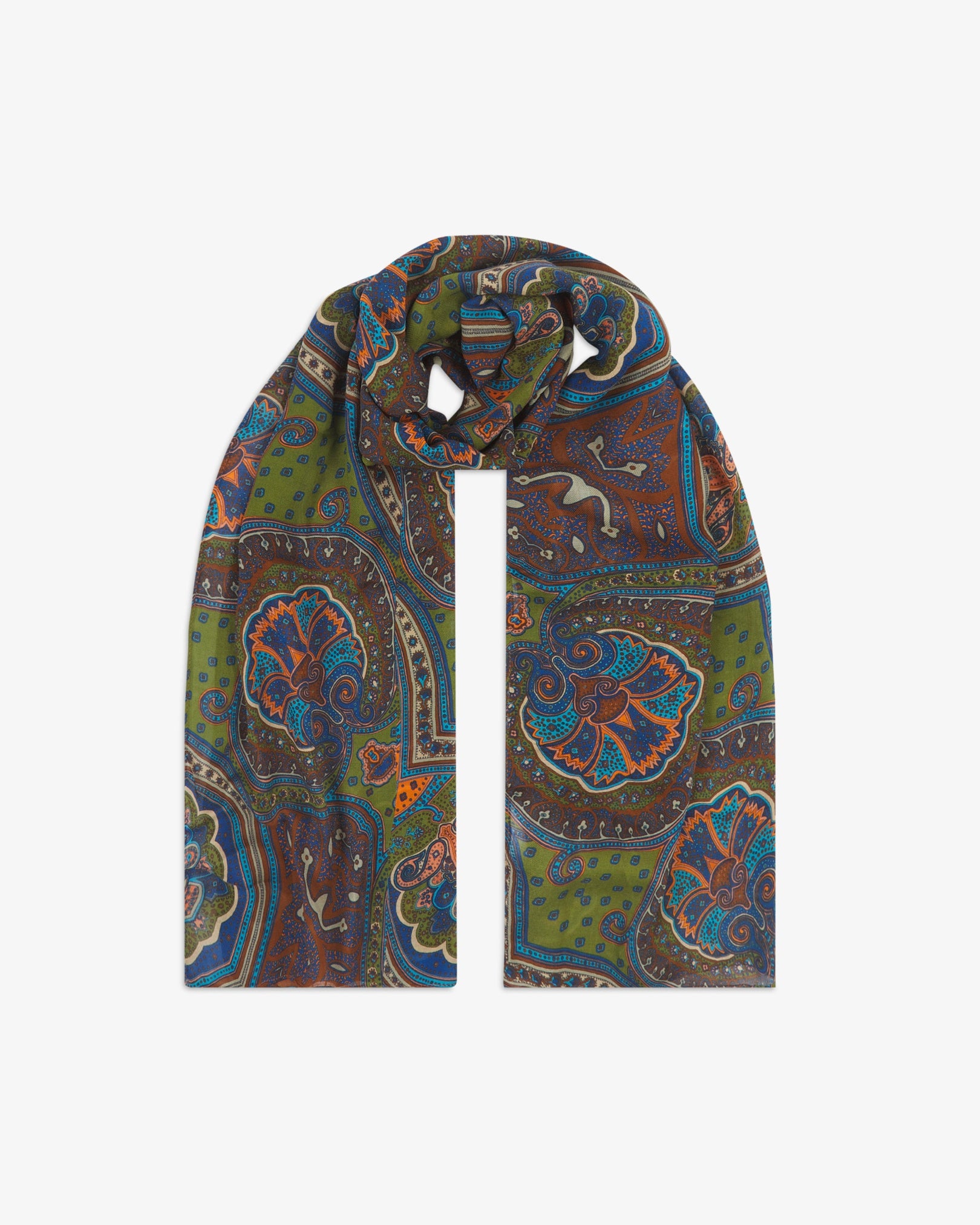 The Montreal bohemian wide scarf looped with both ends parallel, showcasing oversized abstract paisley-inspired motifs in earthy shades of olive green, brown, blue and burnt orange across the soft modal and wool blend fabric.