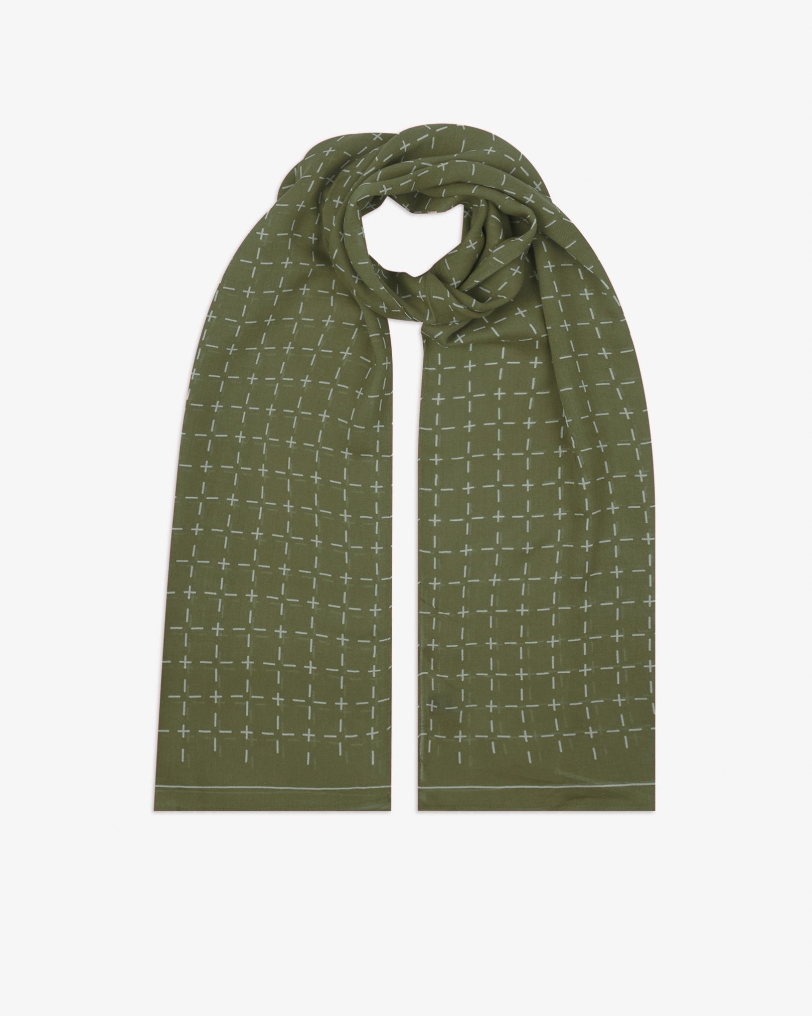 The 'Crosses' olive bohemian wide scarf looped with both ends parallel, showcasing a neat geometric grid of dashes and crosses on a muted olive background across the soft modal and wool blend fabric.