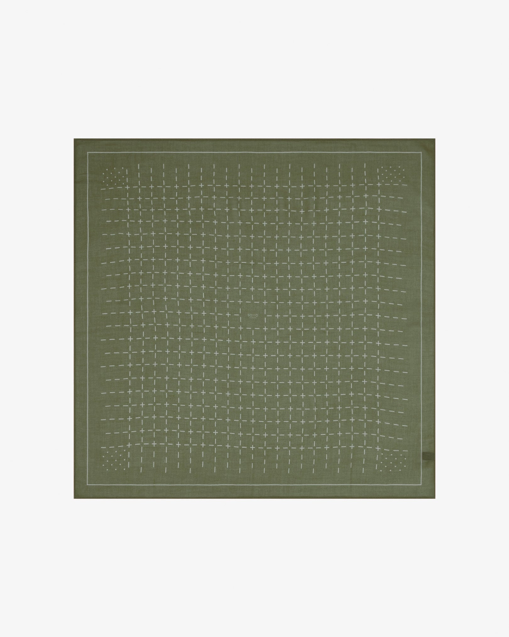 Fully unfolded 'Crosses in Olive' modal and wool bandana, displaying the complete repeating geometric grid pattern of dashes and crosses in muted olive and contrasting tones framed by a wide border.