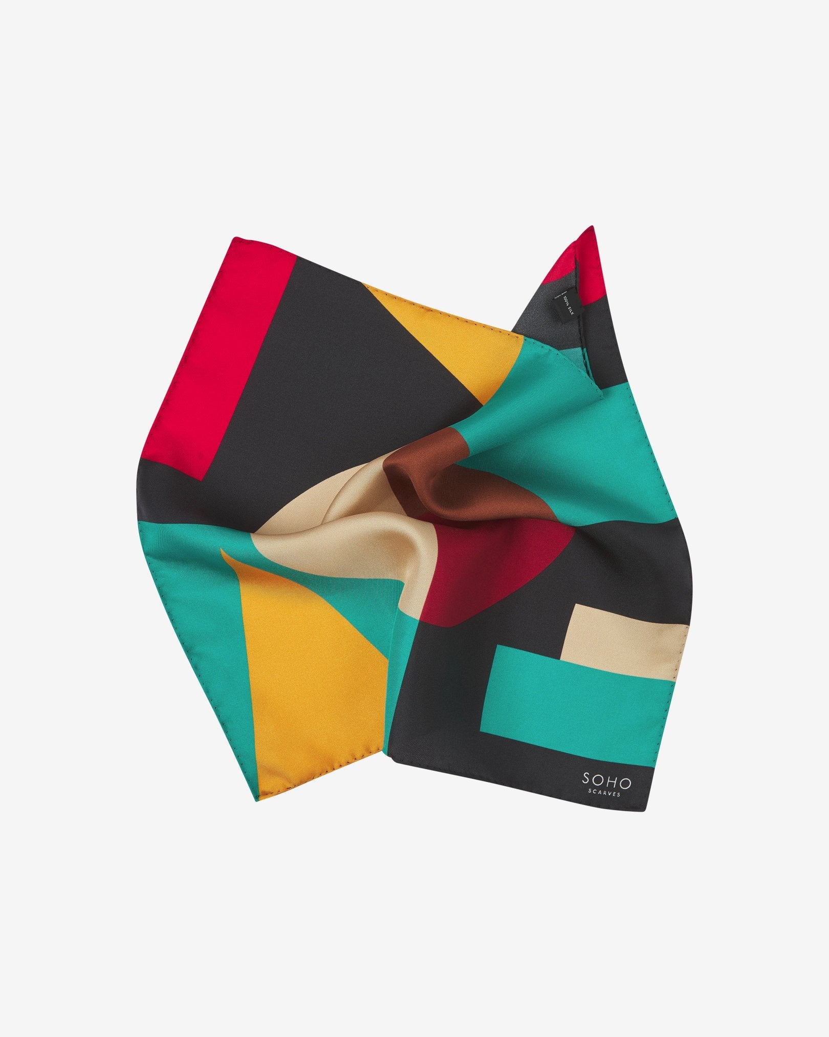 The 'Berlin' pocket square pinched and twisted in the middle, showing the geometric and bauhaus-inspired pattern.