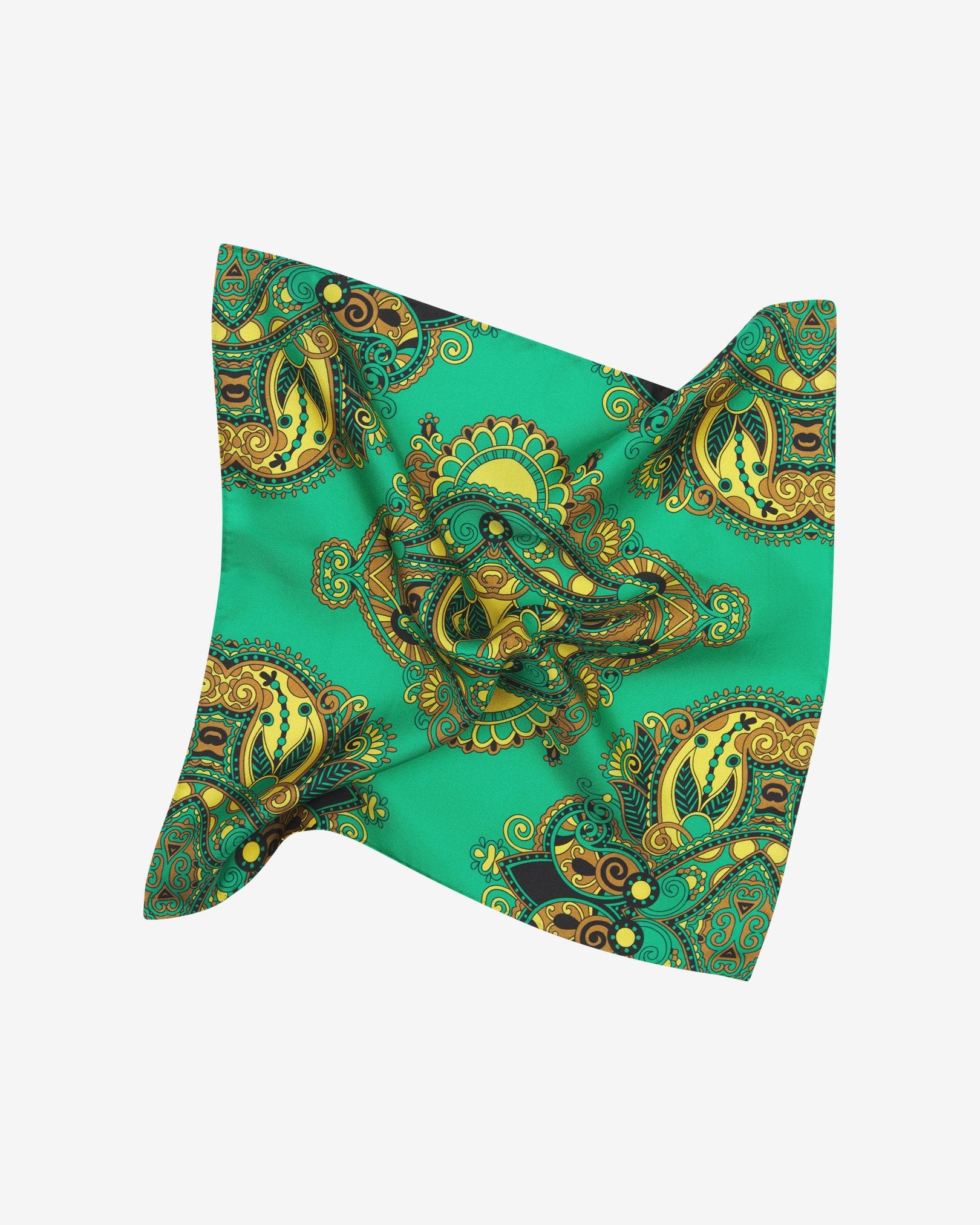 The 'Forks' silk pocket square pinched and twisted in the middle, presenting a closer view of the golden Fleur-de-Lis pattern on an emerald-green background and lustre of the silk material.